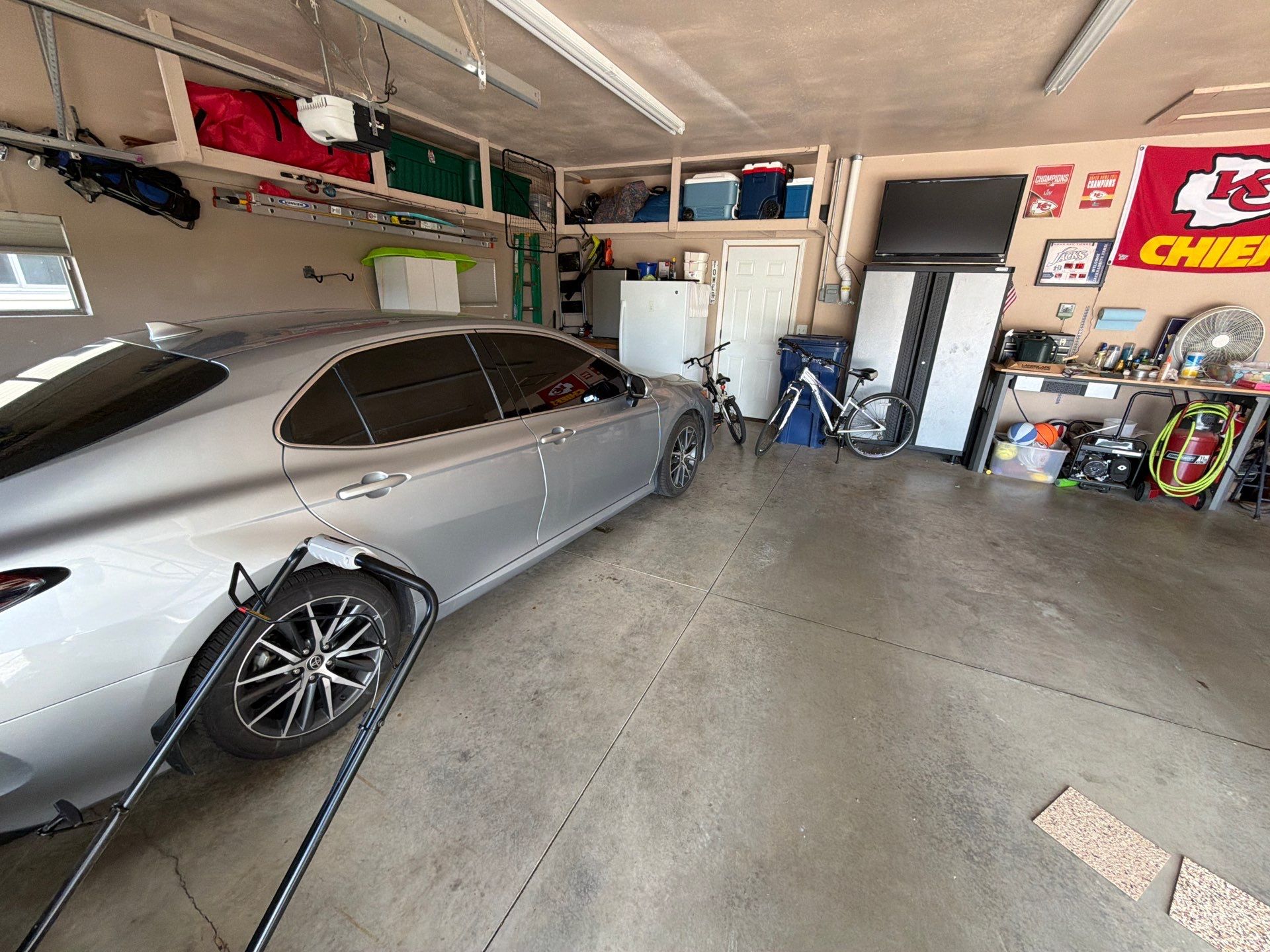Multi-Car Garage Floor Coating and Crack Repair in Tea by Select Painting, Coatings & Garage Cabinets