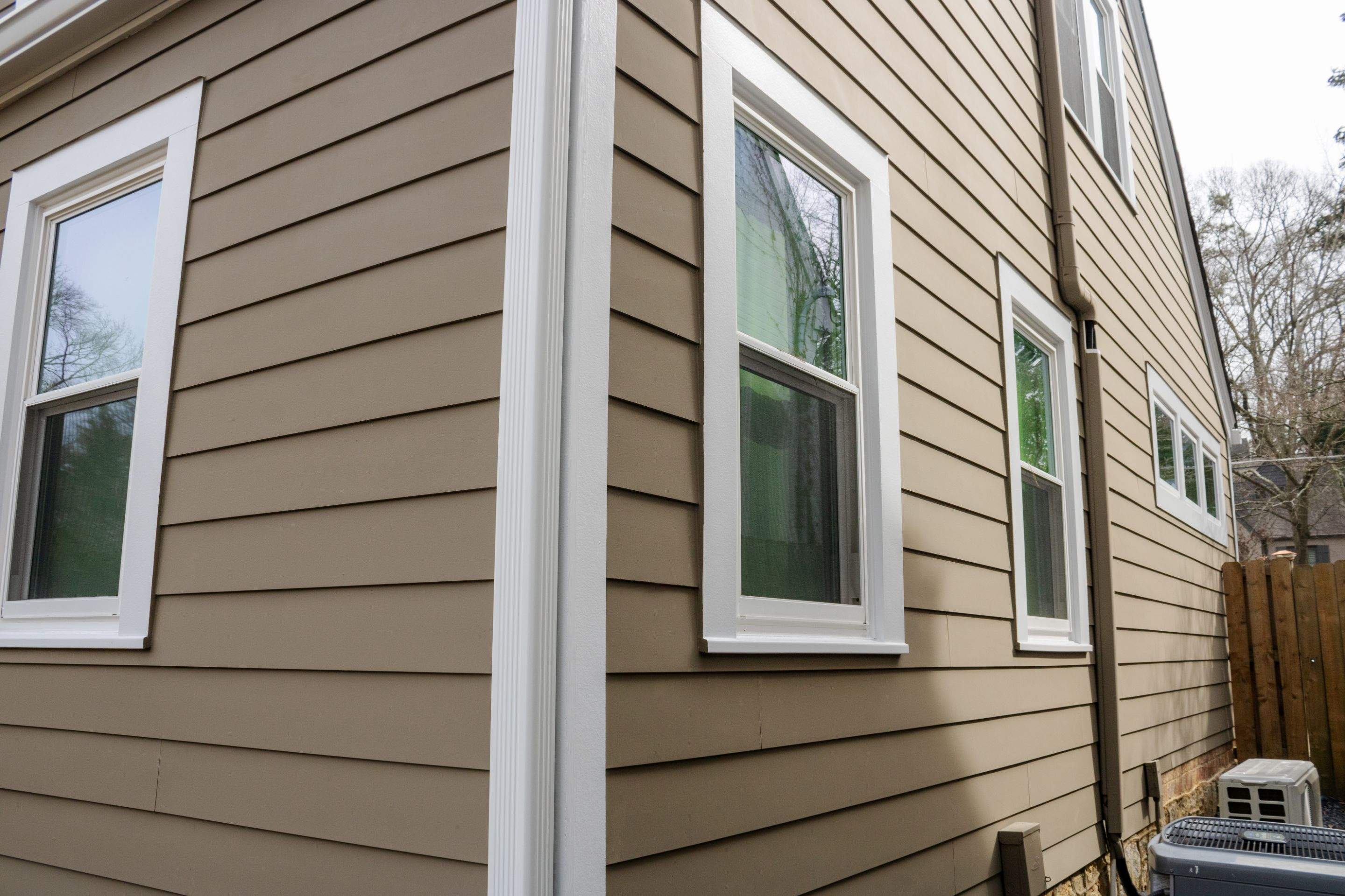 Full Siding Replacement, Deck Build, Exterior Paint, and Gutter Replacement by Nelson Exteriors