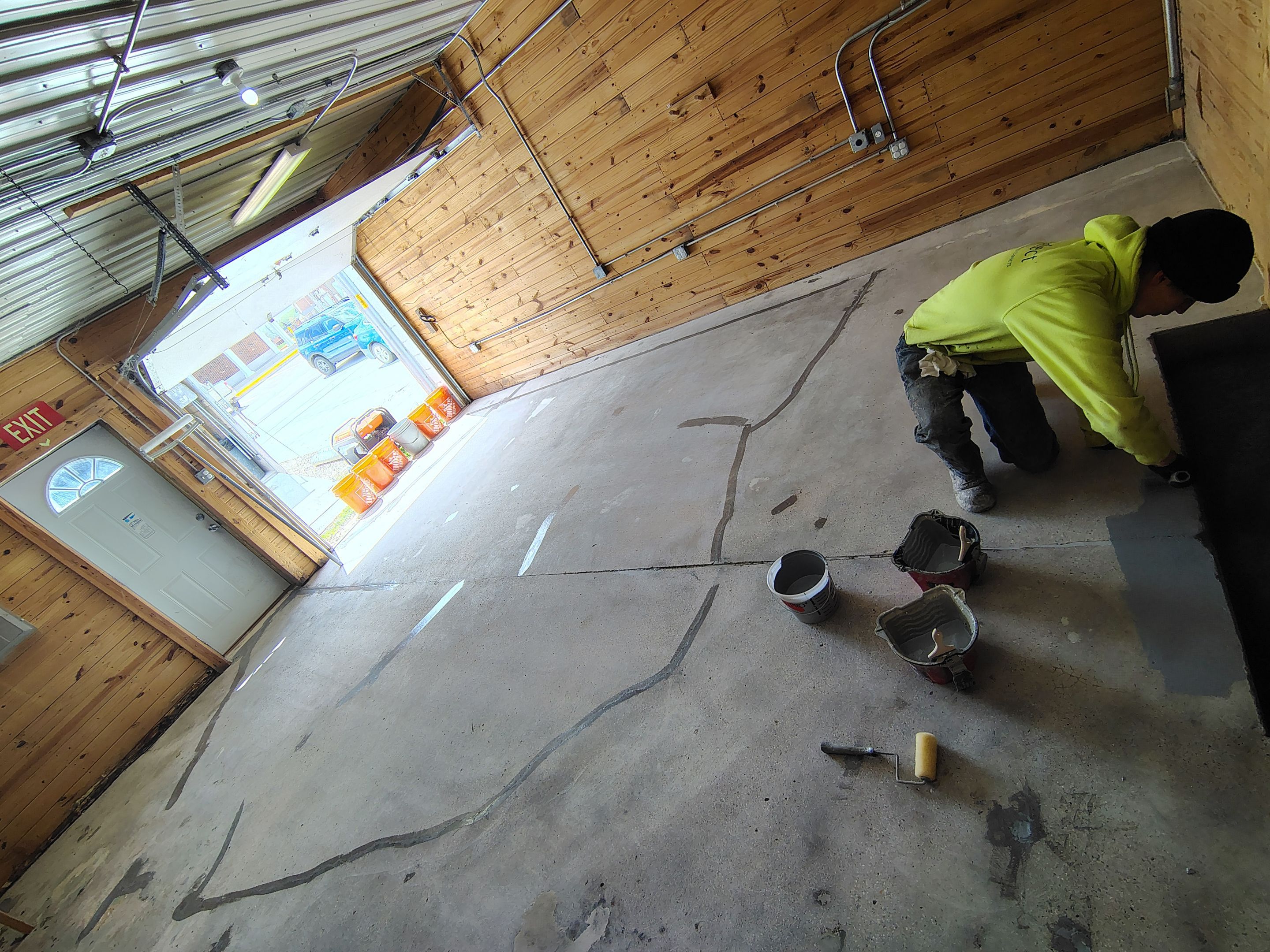 Commercial Epoxy Flake Floor Coating in Emmetsburg, Iowa by Select Painting, Coatings & Garage Cabinets