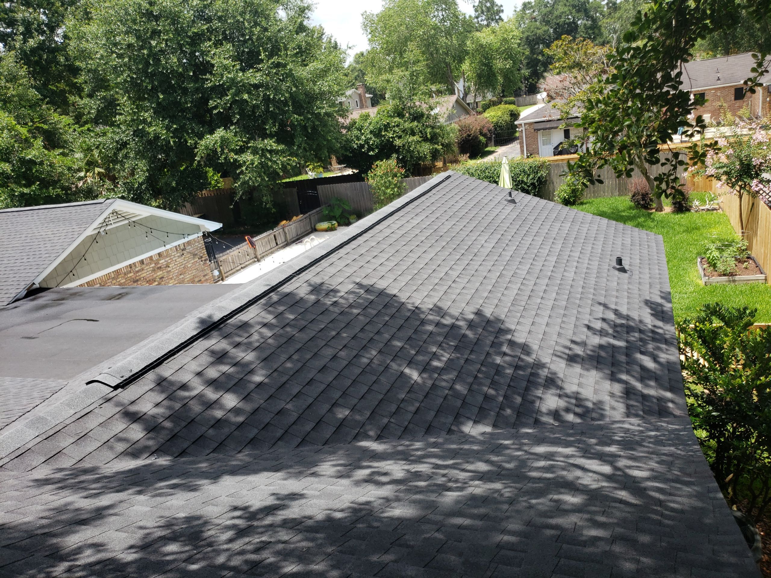 Residential Roofing Installation using Roof Replacement by American Roofing & Construction LLC