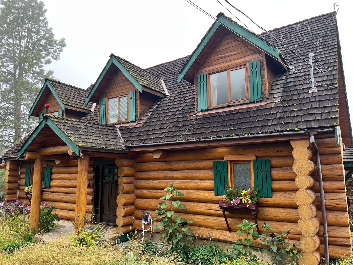 Residential Cedar ReRoofing using Malarky Vista shingles by Top Notch Roofing Inc