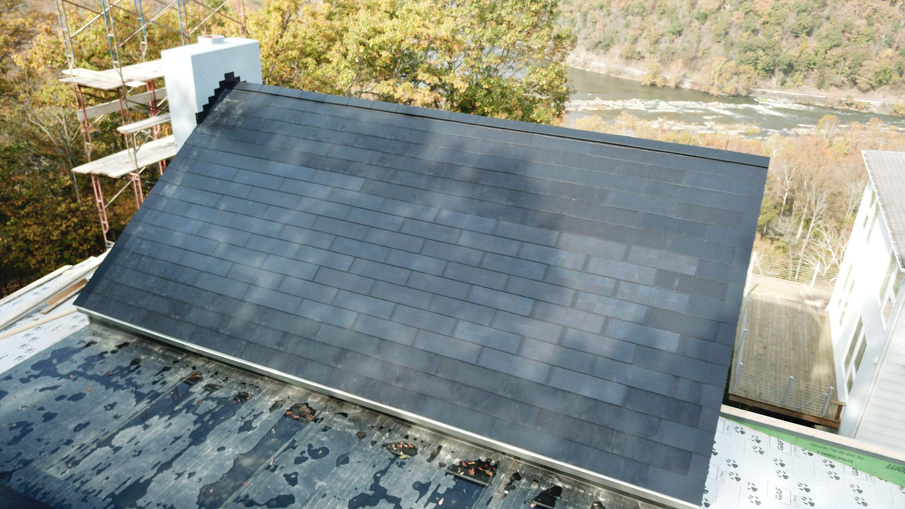 Roof Installation using Tesla Solar Roof V3 by American Home Contractors