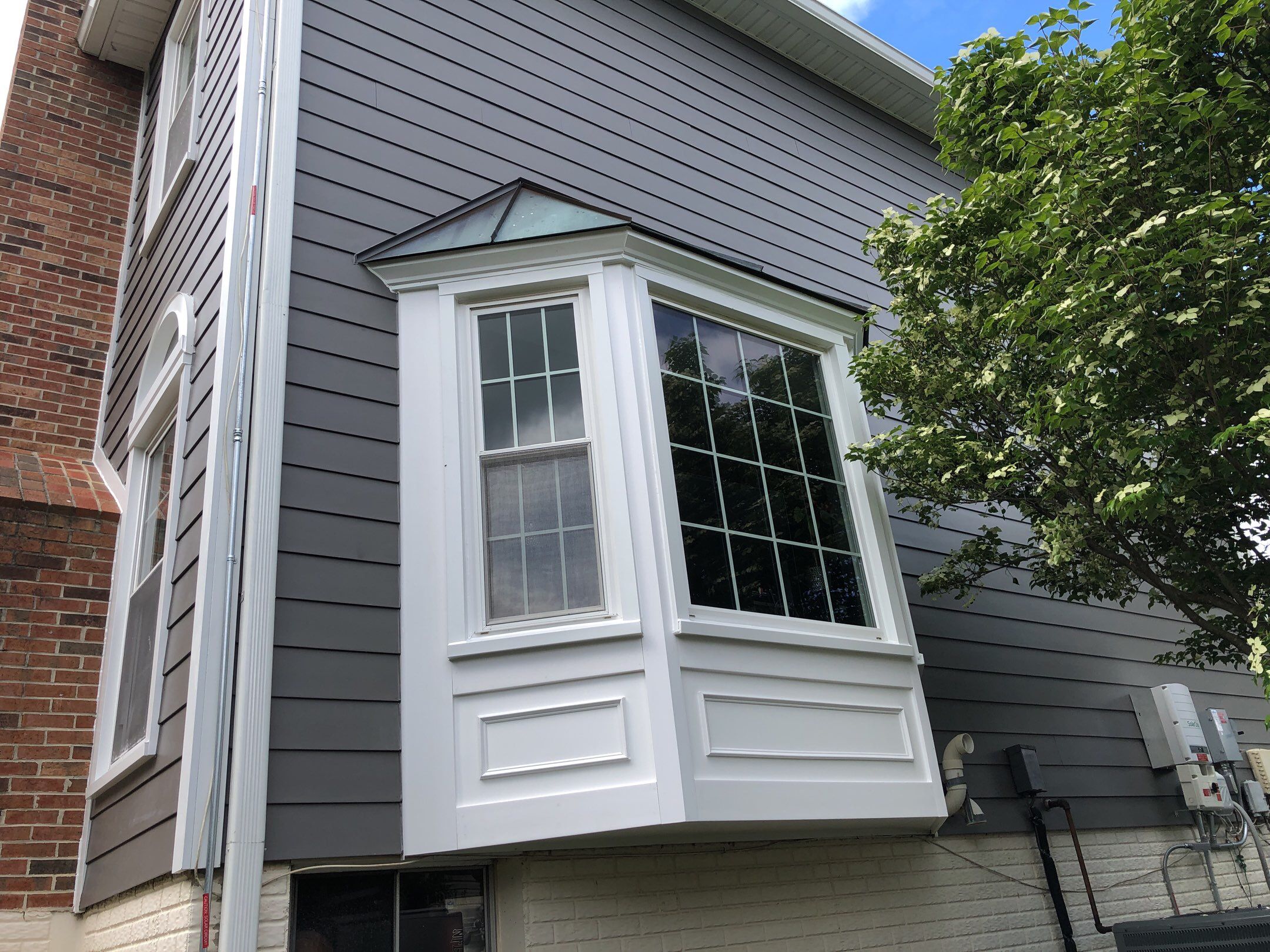 Siding Replacement using James Hardie siding by American Home Contractors