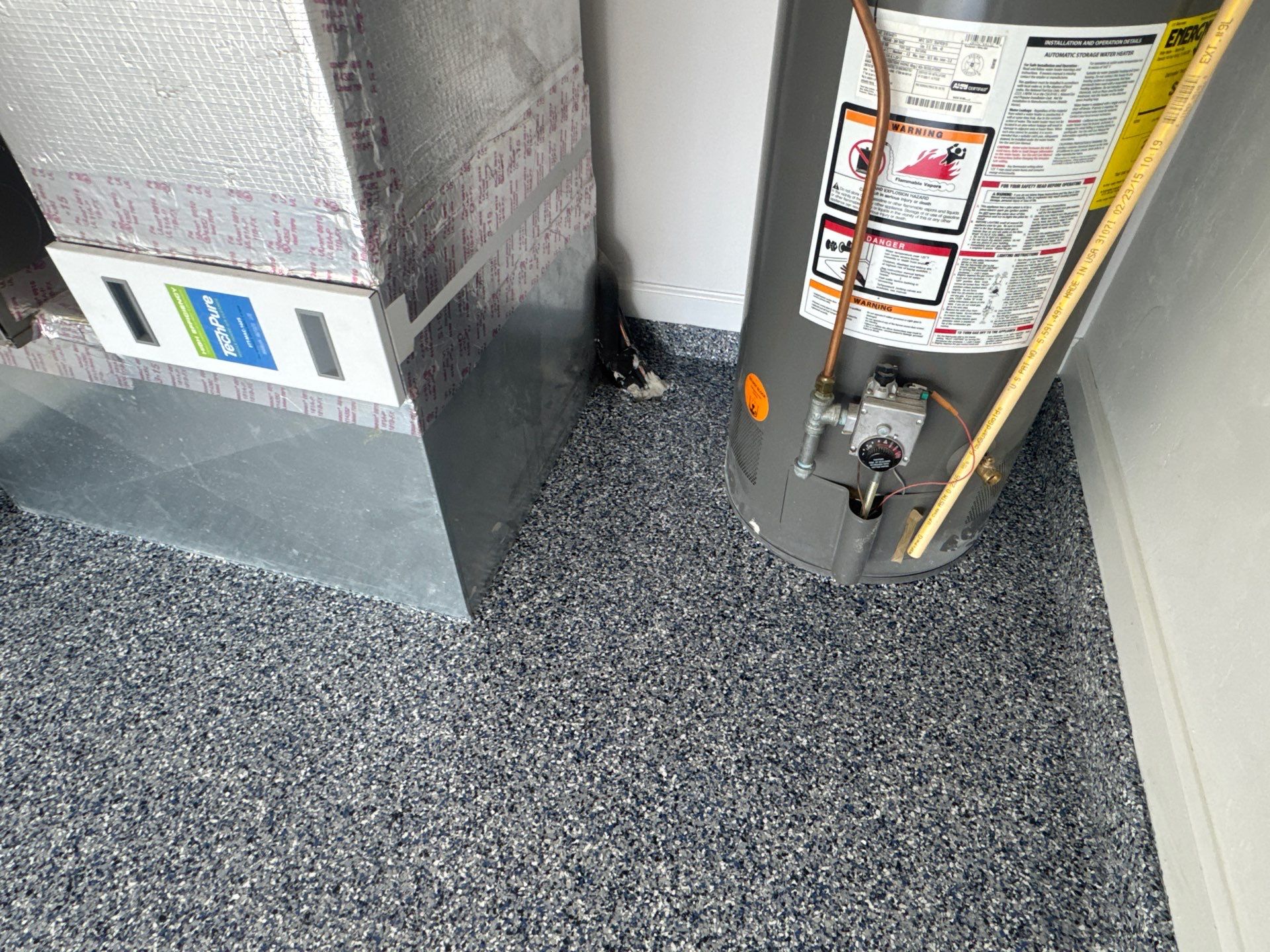 Garage Project in Newberry, FL in Denim by Cross Creek Concrete Coatings