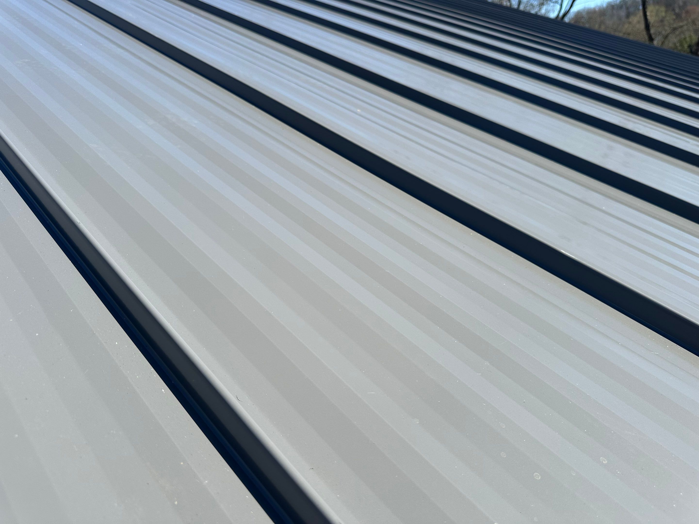 Residential Roofing Installation using Union Corrugatting Metal Roofing by Fahey Roofing + Contracting
