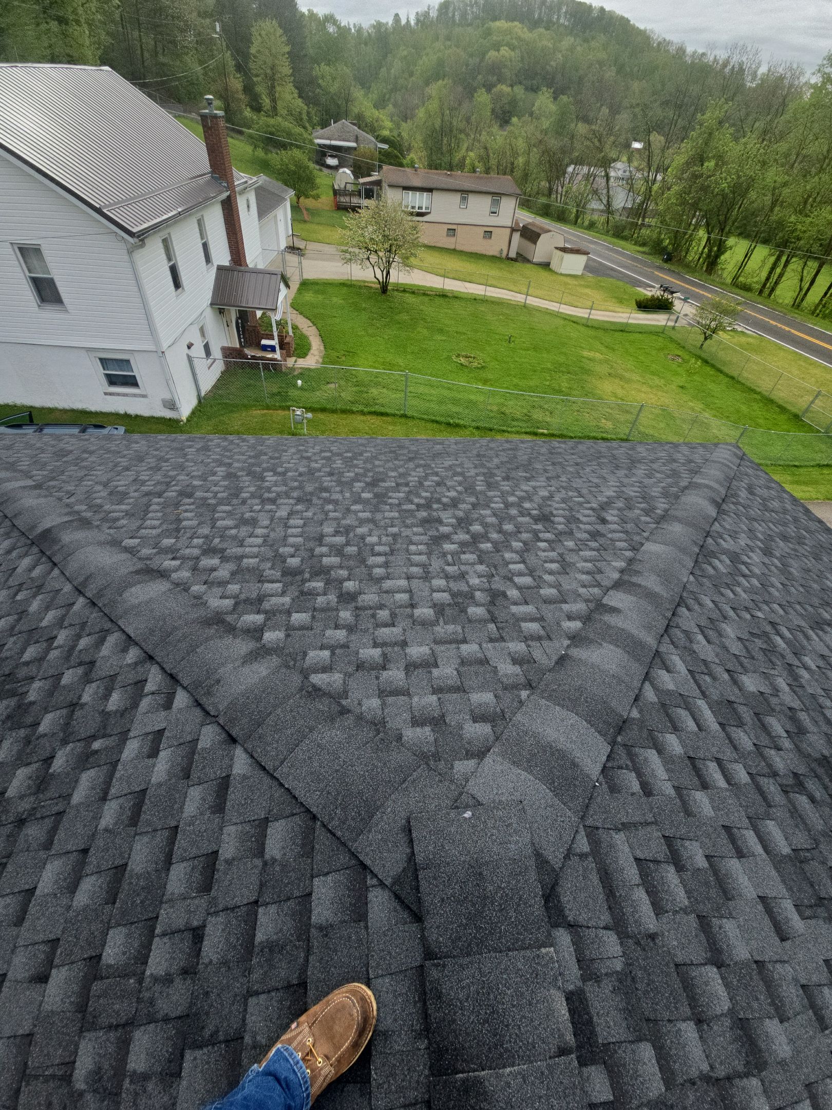 Residential Roofing Installation using GAF Timberline HDZ Charcoal by Rainstoppers Roofing