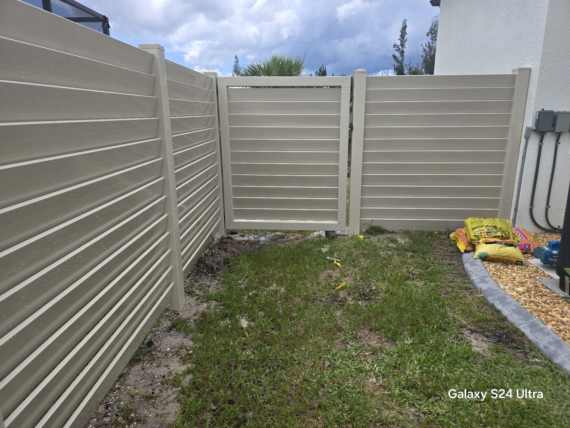 Tan Louvered Vinyl in Port Charlotte by True Fence LLC