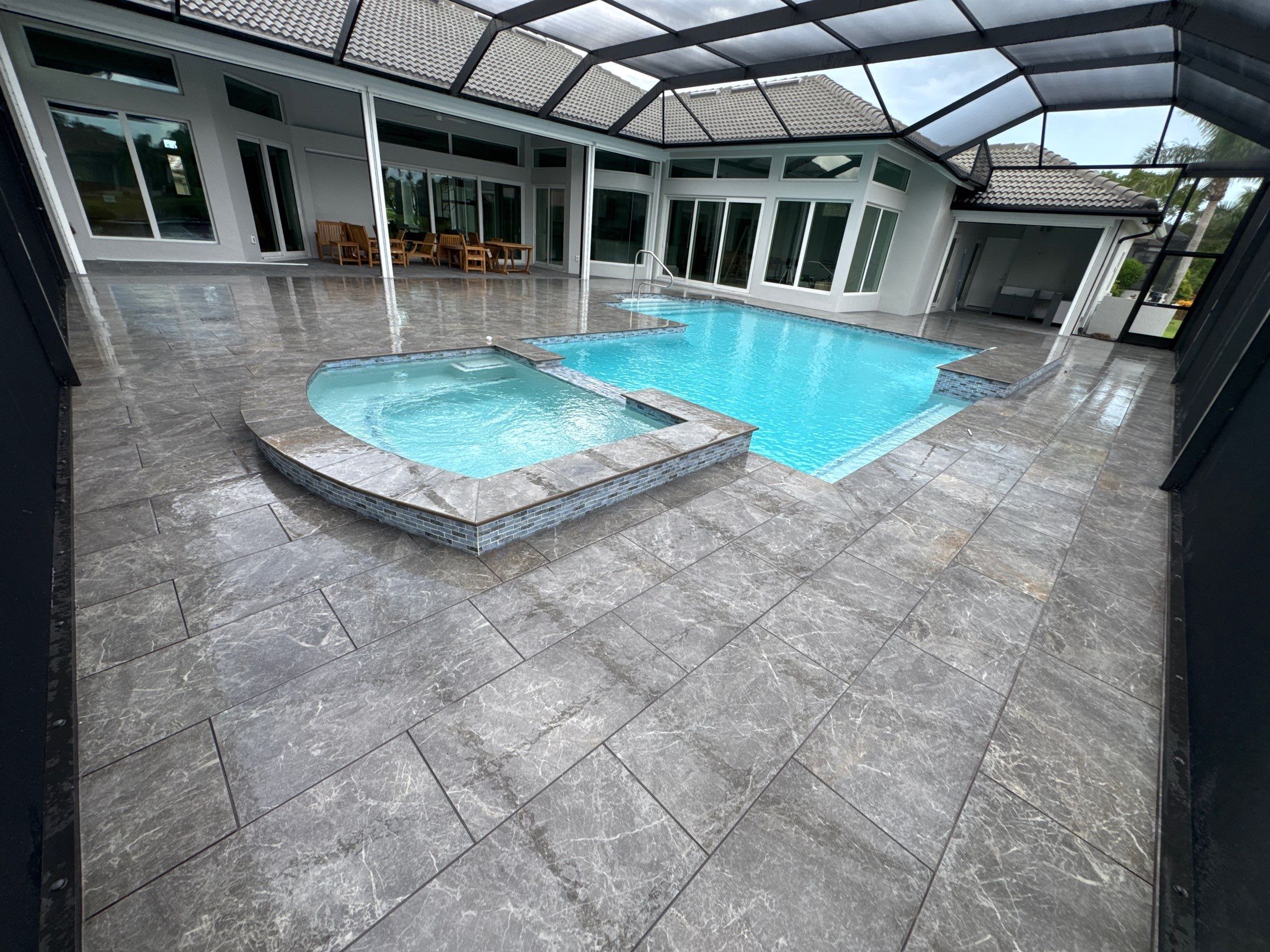 Pool Renovation/Porcelain pavers/Wild Cat Run by Old Town Pavers Llc