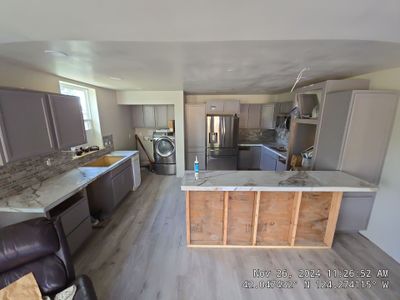 Marble Look Countertop and Stone Tile Backsplash Installation in Brookings