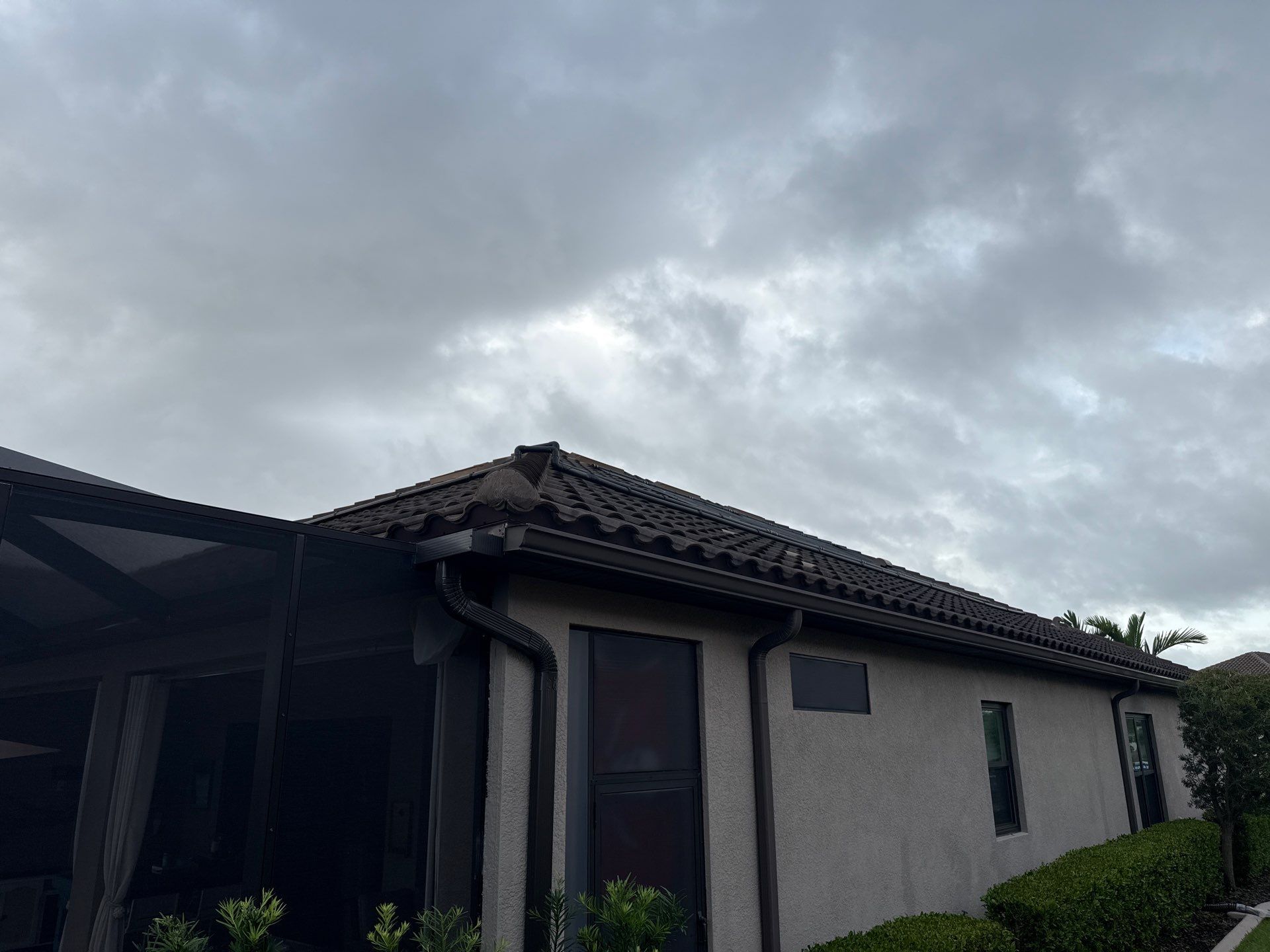 Neighboring Tile Roof Cleaning with Gutter Runoff Control – Palmetto, FL by Sunshine AquaWash