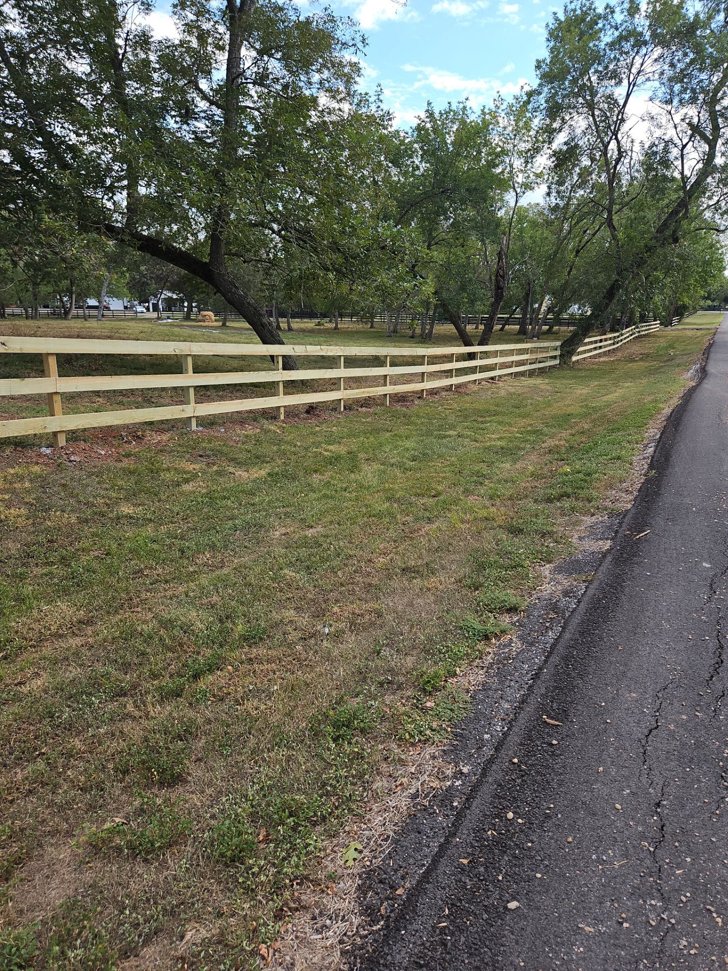 Ranch Style fence Plus Iron installation by Tim's Fences