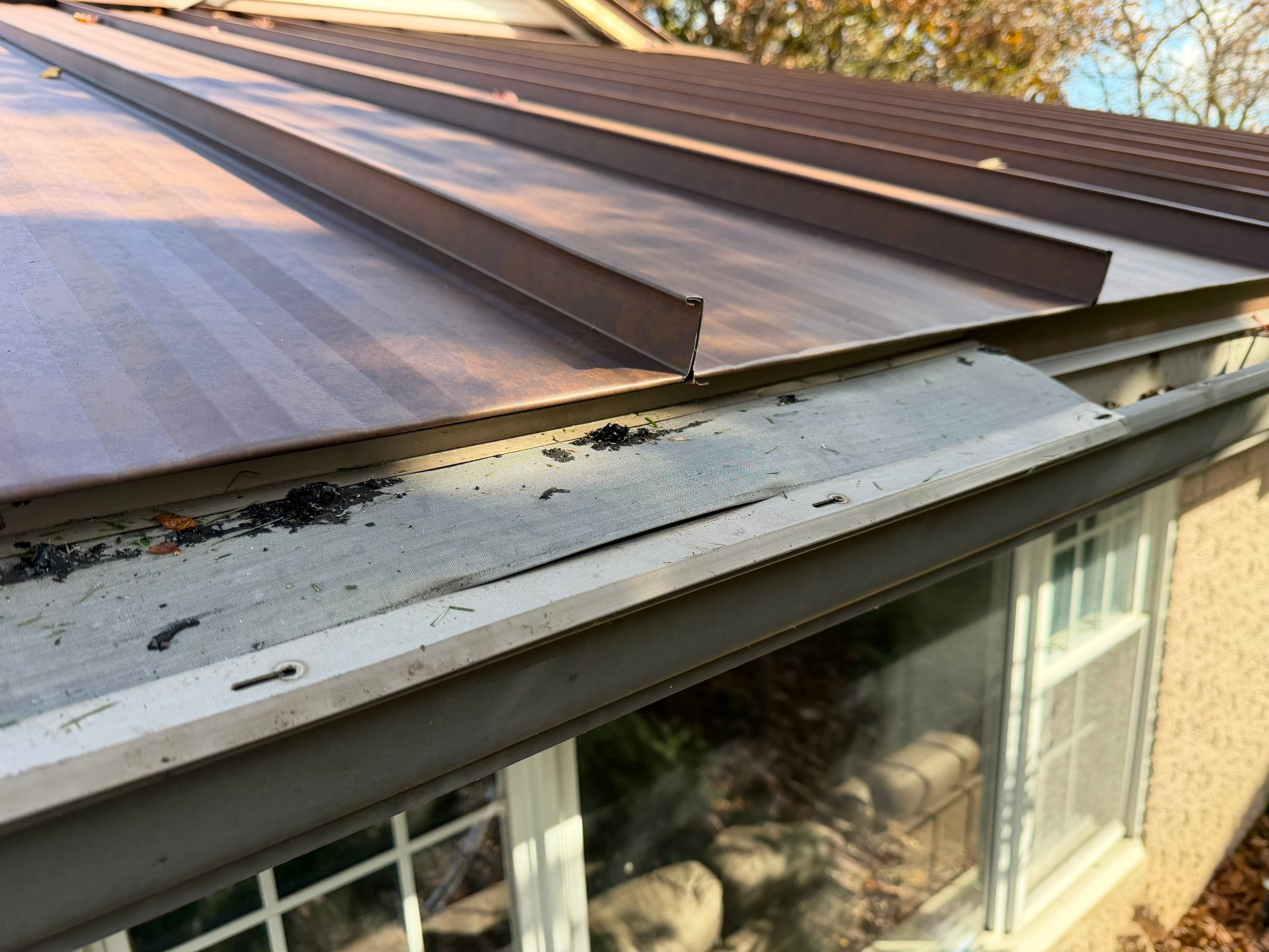 Roof Replacement using MS Standing Seam Roof Western Rust by 180 Contractors