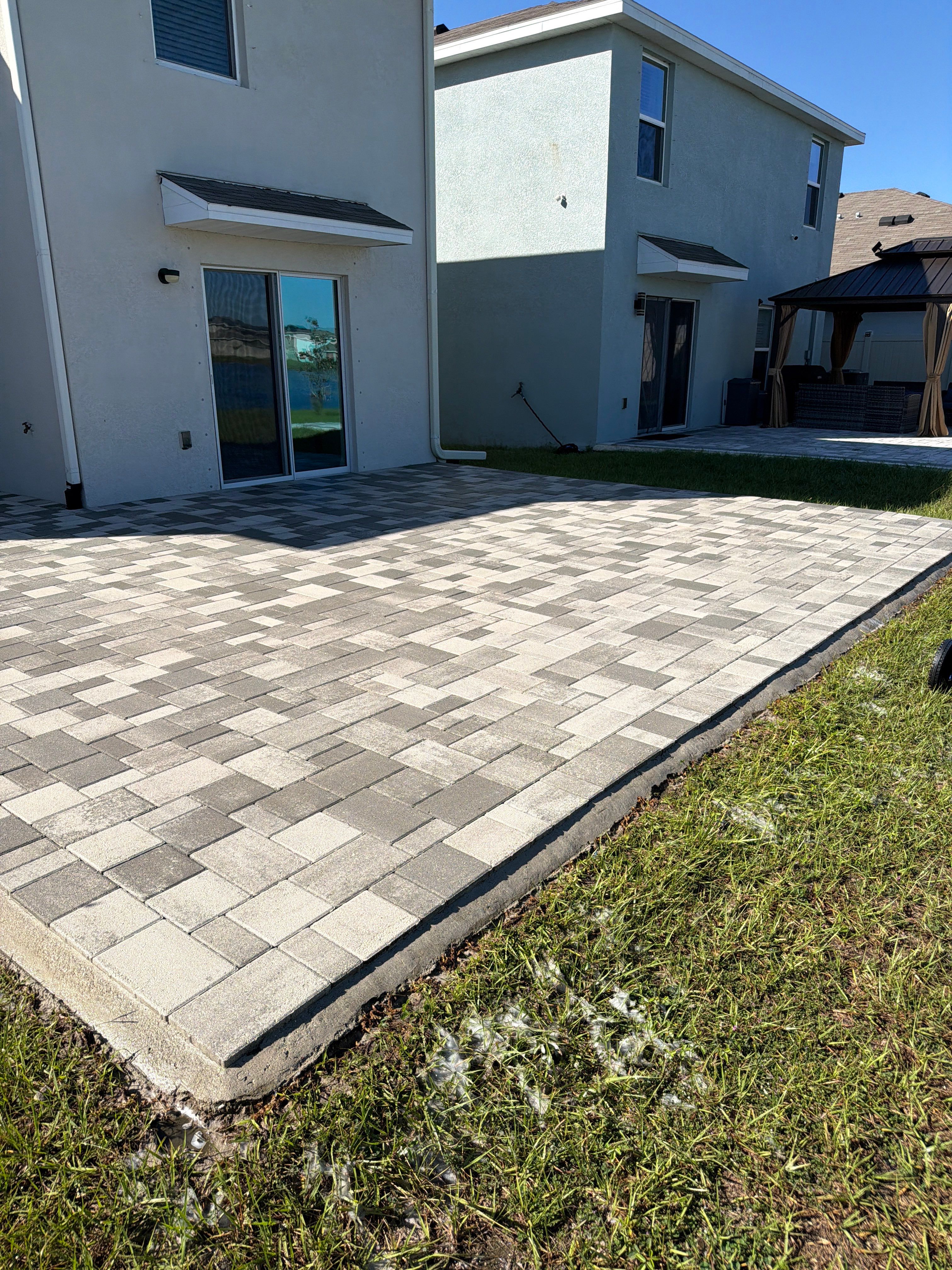 Paver Sealing and Restoration for Large Multi-Toned Patio in Wimauma by Supreme Paver Experts