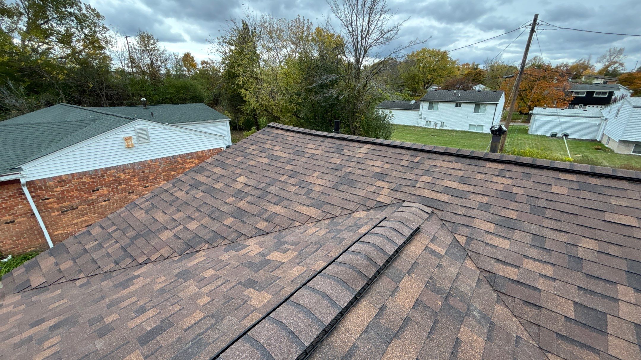 Roof Replacement using Owens Corning Brownwood by 180 Contractors