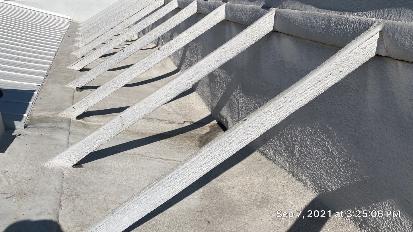 Foam Refurbish using Conklin Benchmark/PUMA XL coatings and spray foam by Straight Edge Roofing Inc