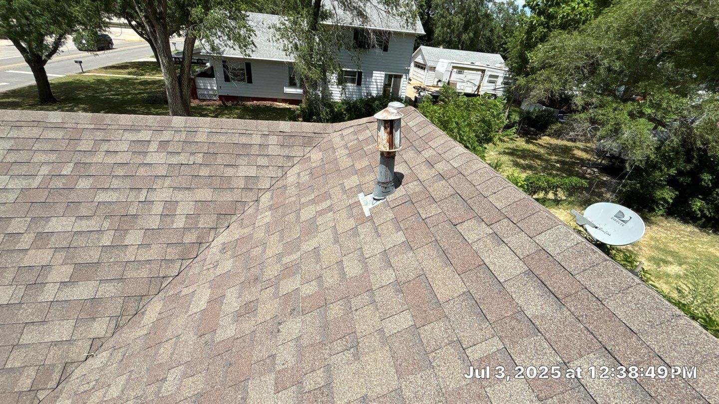Storm Damaged Roof Replacement - Before & After by Eaton Roofing 
