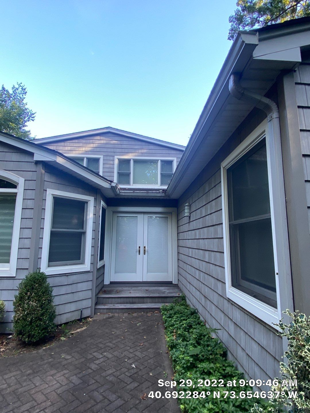 Gutter Installation using 5"white K style seamless gutters and 2x3 white leaders, and Microguard gutter shields installed.  by Above All Gutters 