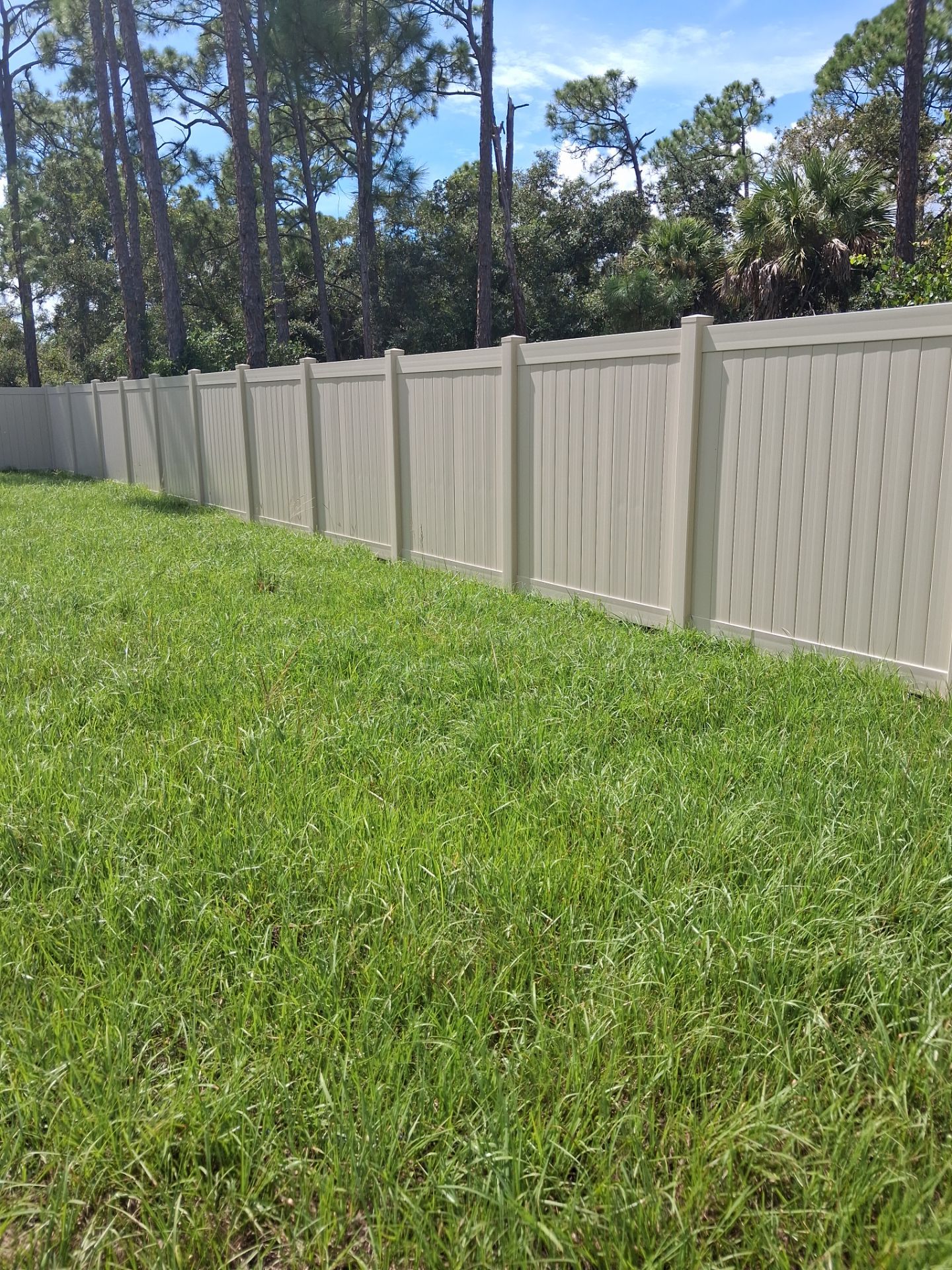 Tan Vinyl Privacy Fence and Gate Installation in Port Charlotte by True Fence LLC