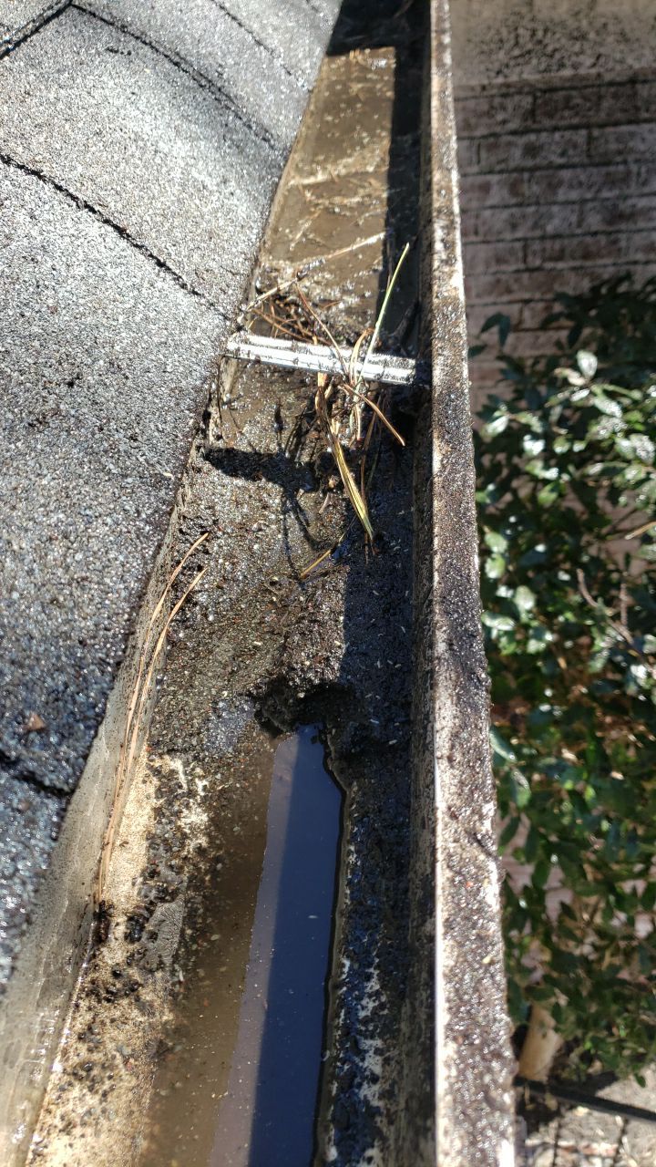 Gutter Cleaning using water by Power Wash Masters LLC