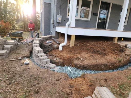 Retaining wall, walkway, small patio and landscape install by The Smet Companies, LLC