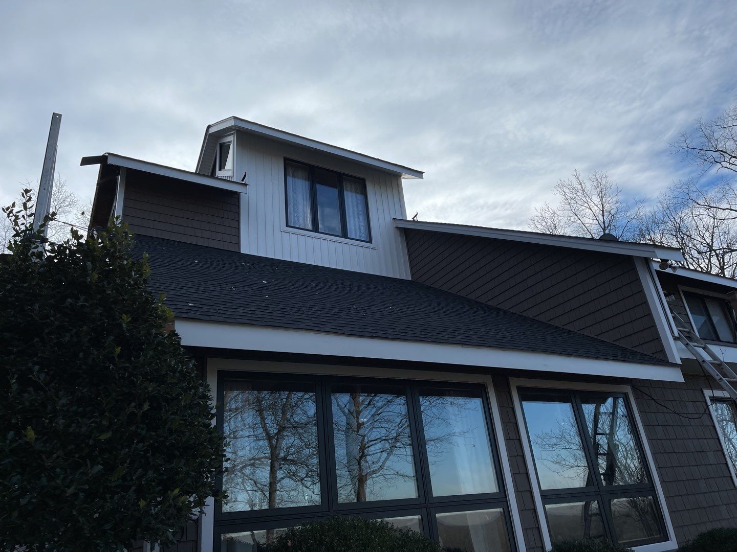 Roof, Siding, Soffit, Trim, and Gutter replacement by American Home Contractors