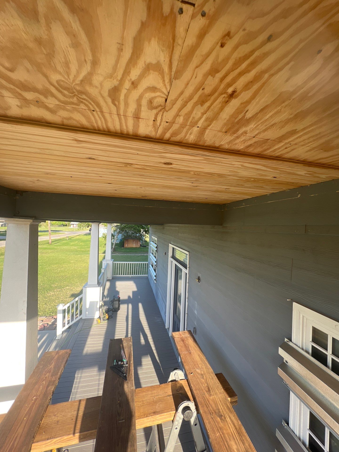 Patio? We got you Covered! by Bayfront Roofing and Construction