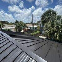 24ga 1.5" Mechanical Seam Dark Bronze by Total Roofing System The Metal Roof Experts
