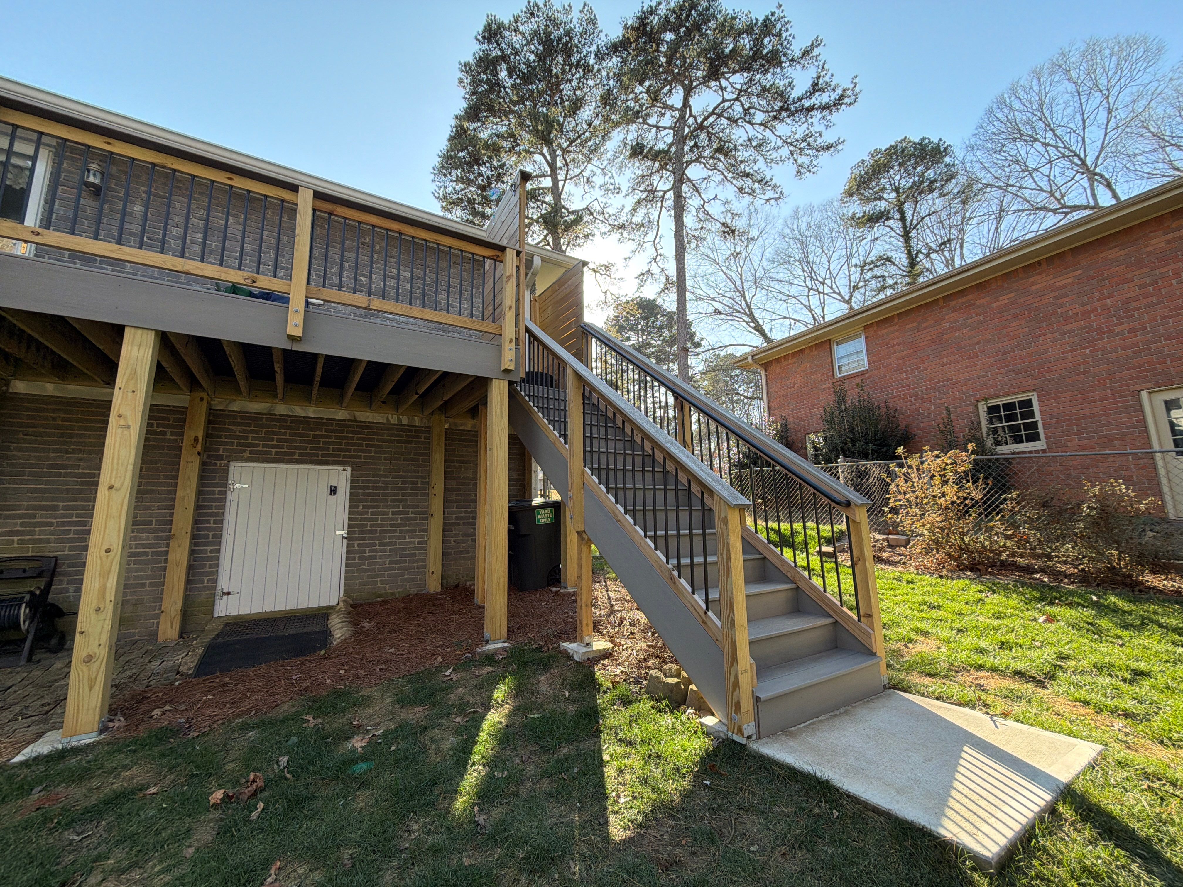 James Hardie Siding Replacement, Trex Railing Install, Exterior Painting, and Staining in Stone Mountain, GA by Nelson Exteriors 