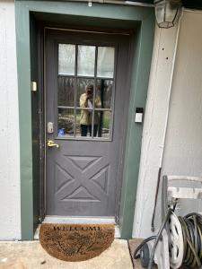 Exterior Entry Door and Garage Door Painting by Legendary Services Company LLC.