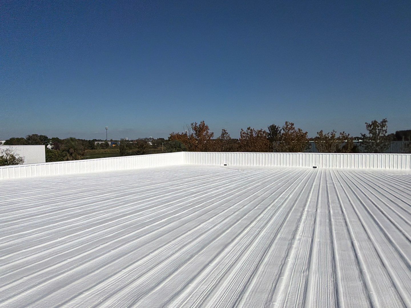 Orlando Commercial Metal Roof Restoration and Silicone Coating System by CES Roofing