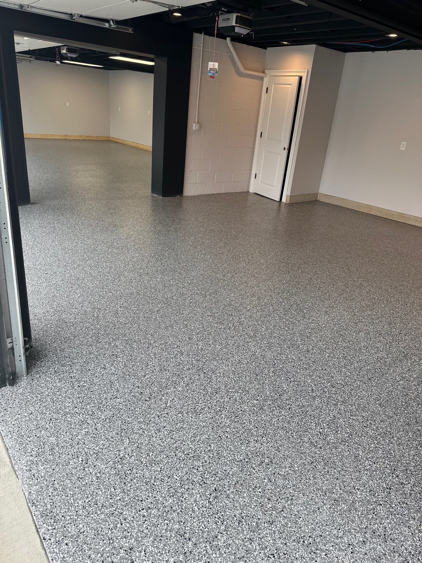 Garage Floor Coating using Wombat by My Garage Floor Guys