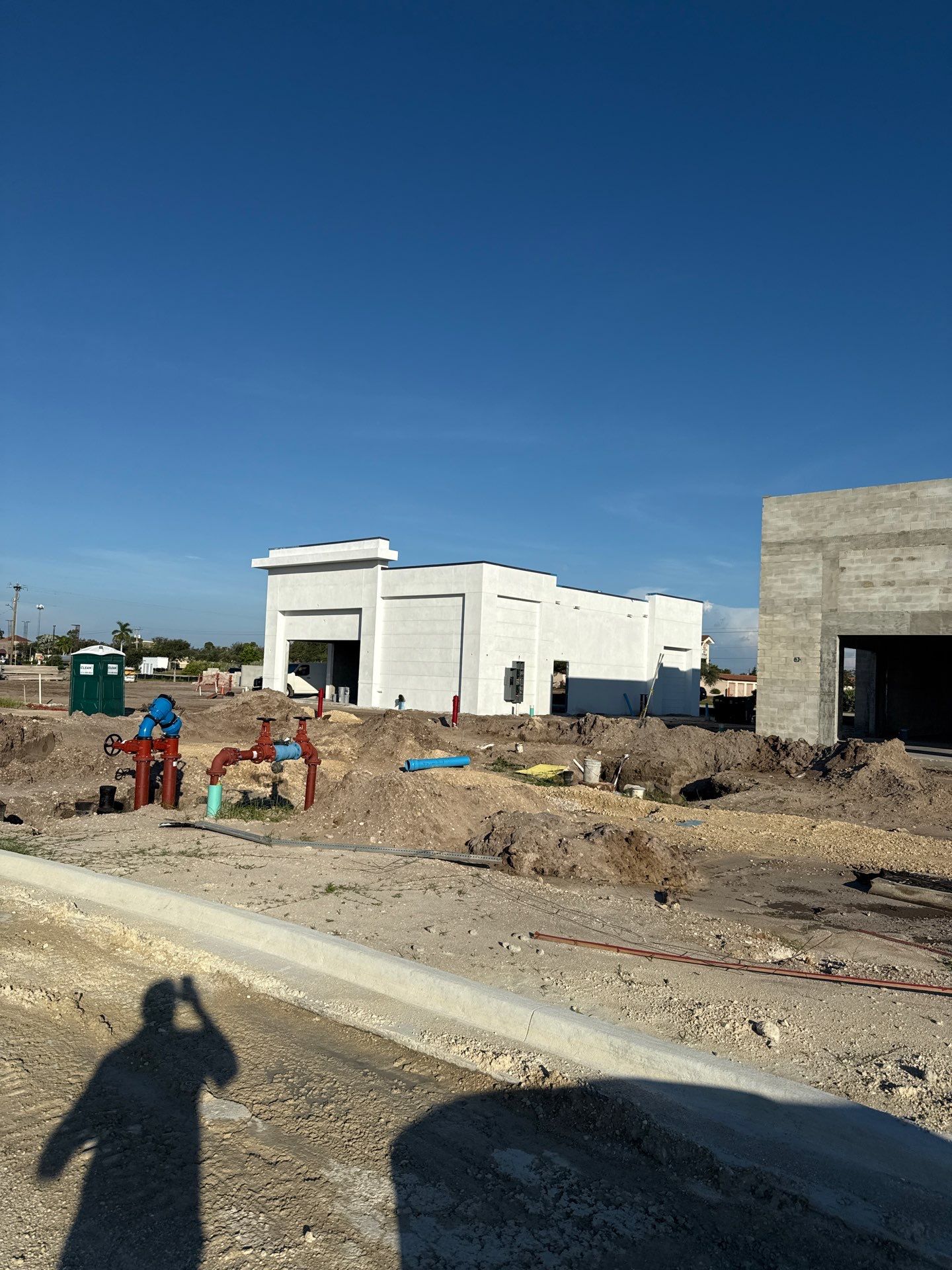 Downspout Installation using collector head in Cape Coral FL by Gutter Professors
