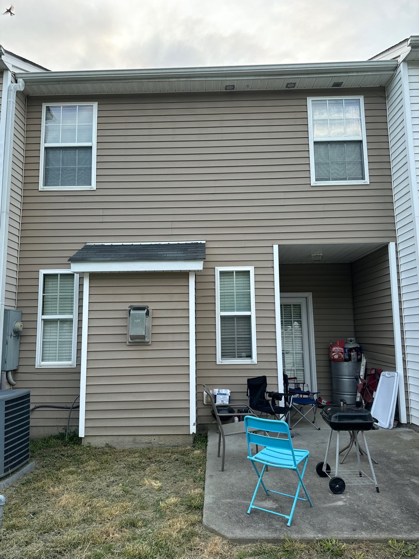 pressure washing exterior siding windows and possibly concrete patio area to remove dirt and grime