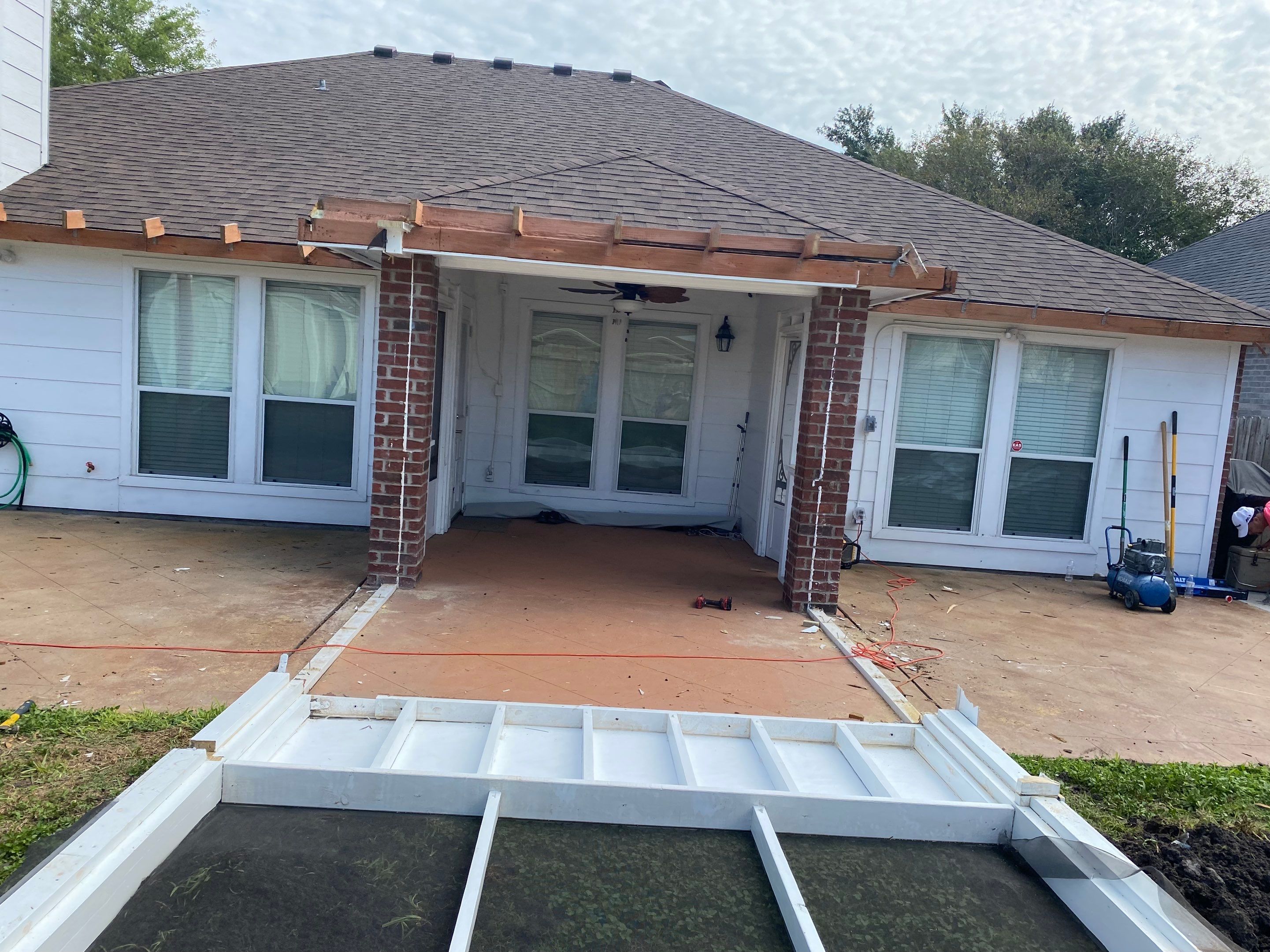 Back Yard Shade by Bayfront Roofing and Construction