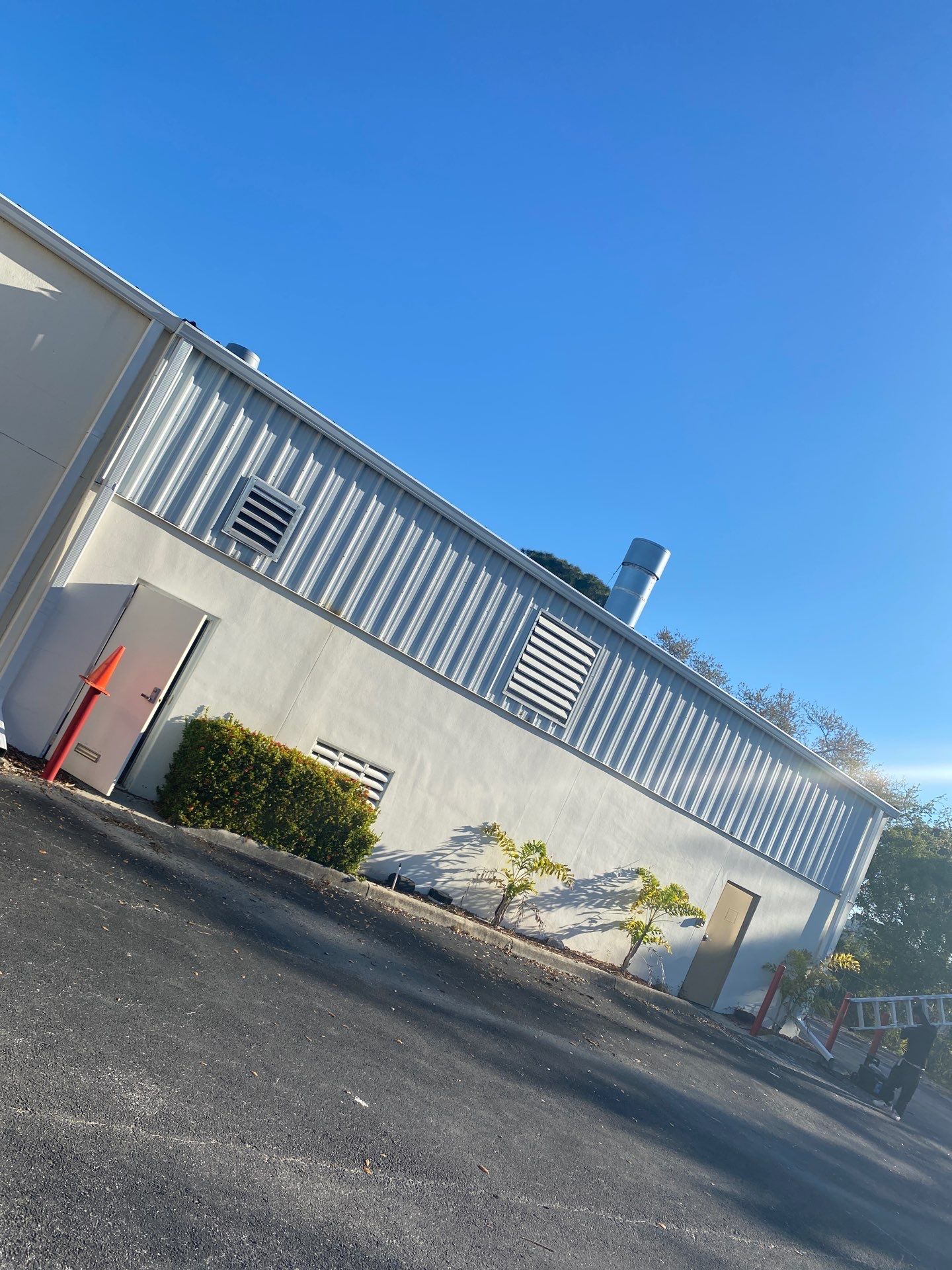 White 6-Inch Gutters with Downspouts in Bradenton FL by Gutter Professors