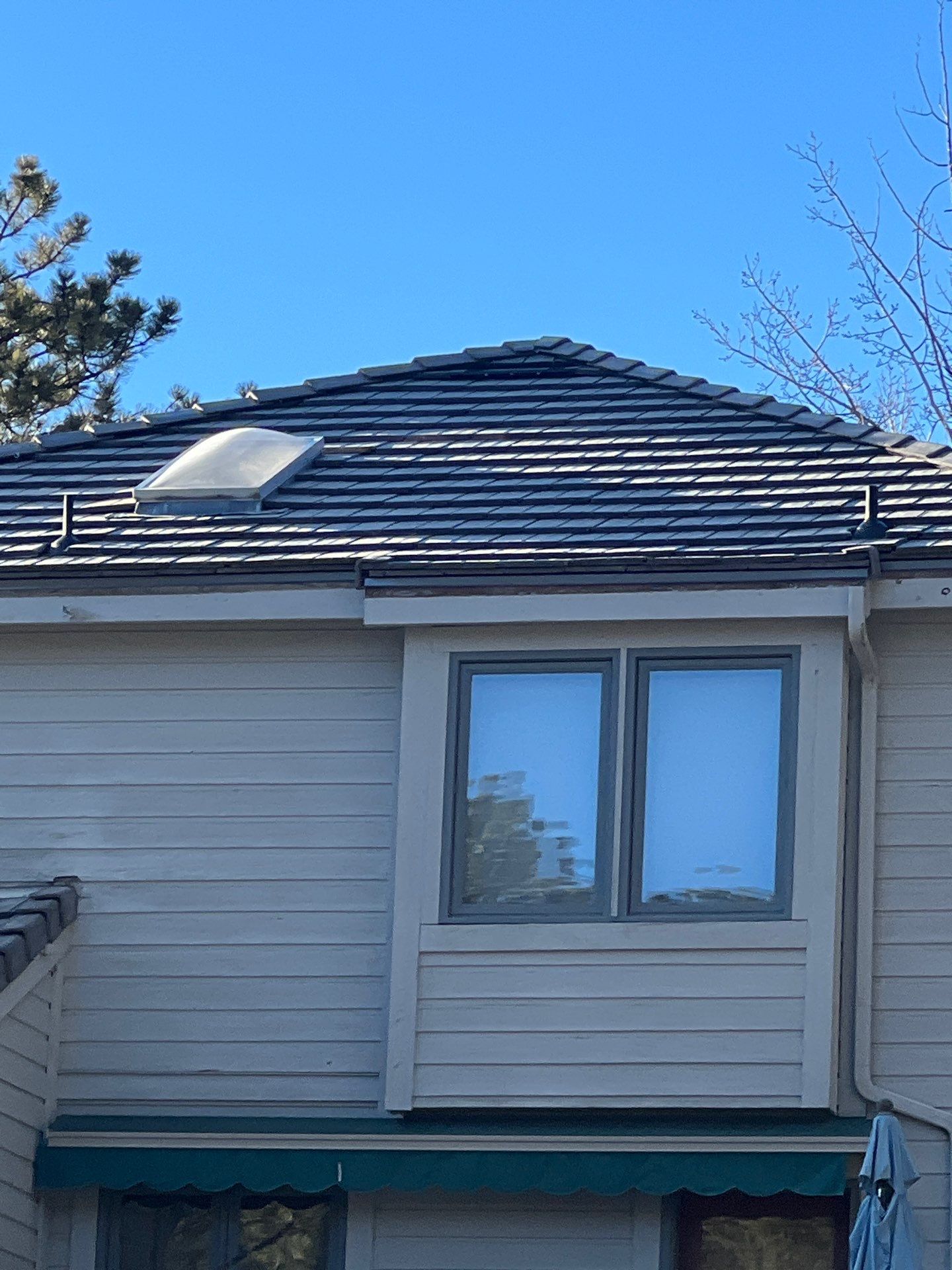 Residential Roofing Installation using Concrete Tile by Blue Peaks Roofing LLC 