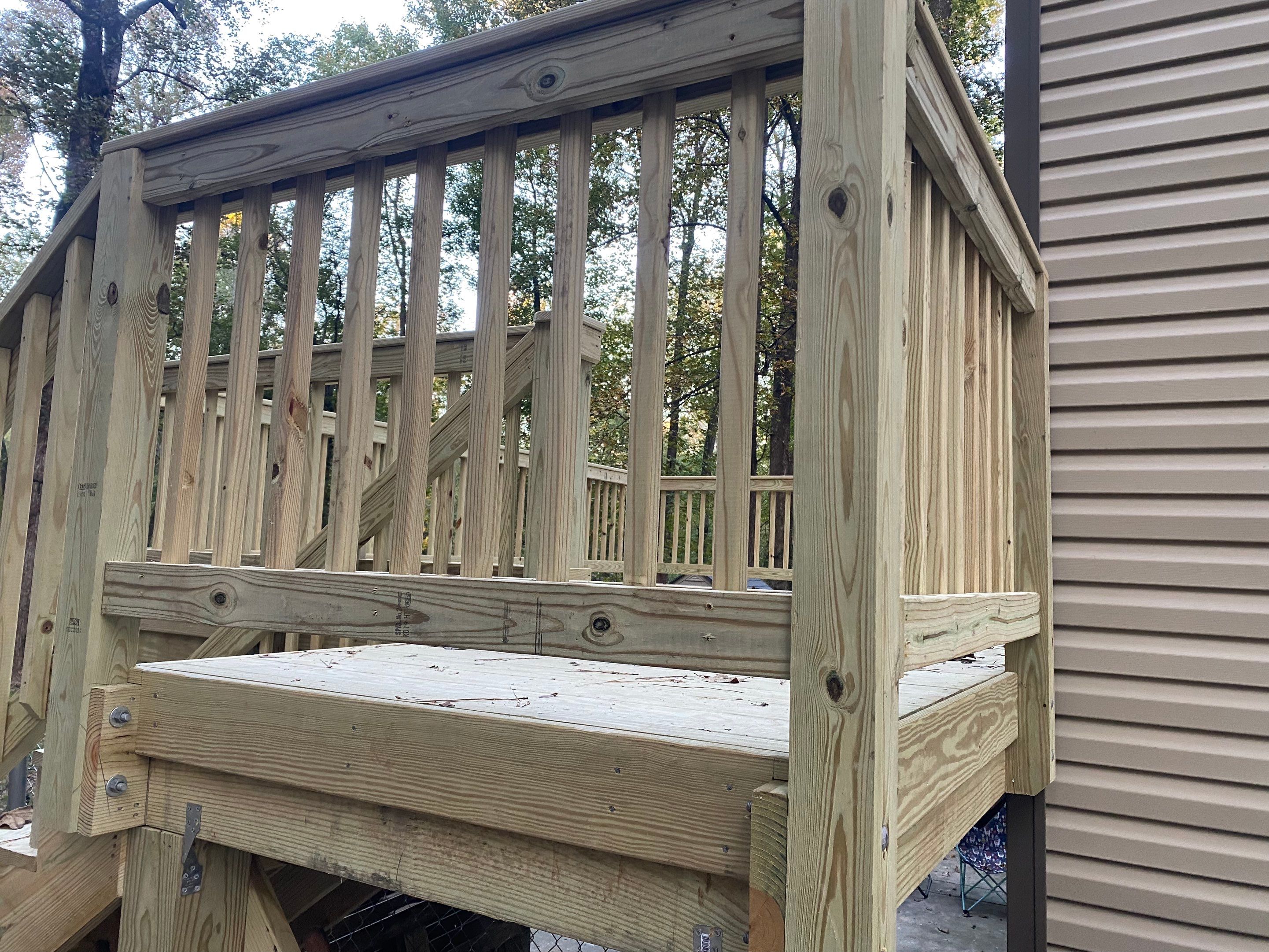 Custom Elevated Pressure-Treated Wood Deck Installation in Raleigh by The Remodeling Company