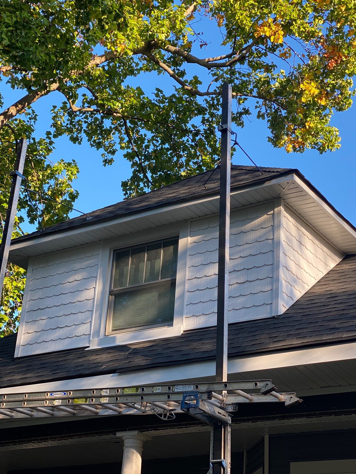 Asphalt Roof, Vinyl Siding, and Aluminum Gutter Replacement by Custom Installations