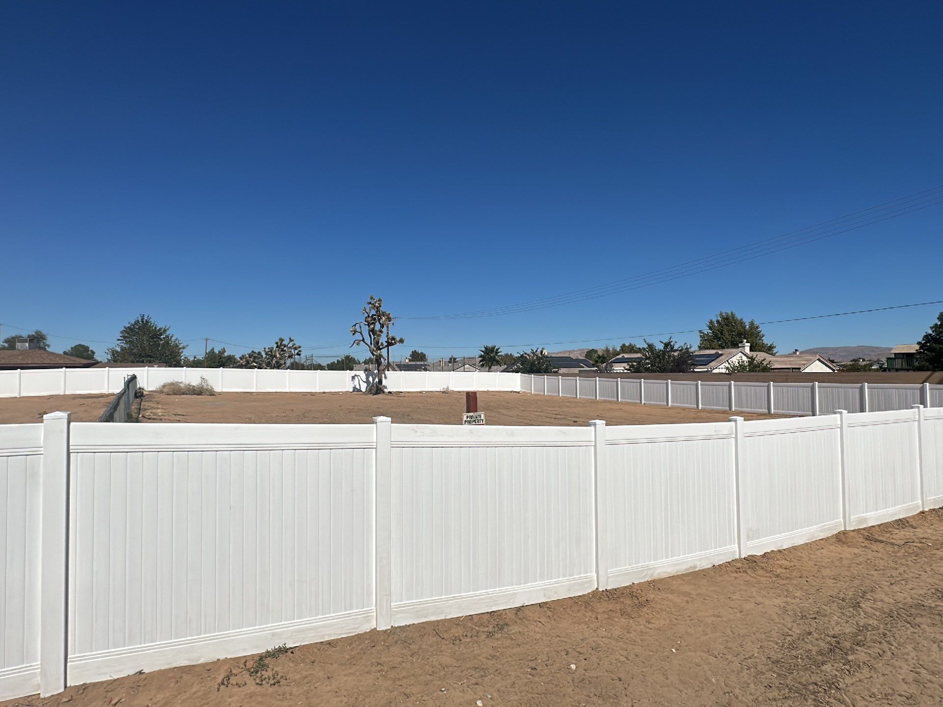 White picket fence  by Fence Guys Inc. 