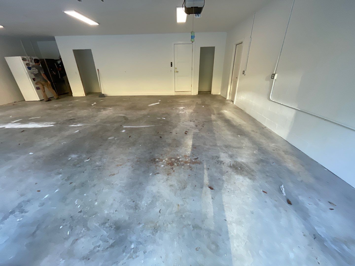 Garage Project in Gainesville, FL in Hybrid Turquoise  by Cross Creek Concrete Coatings