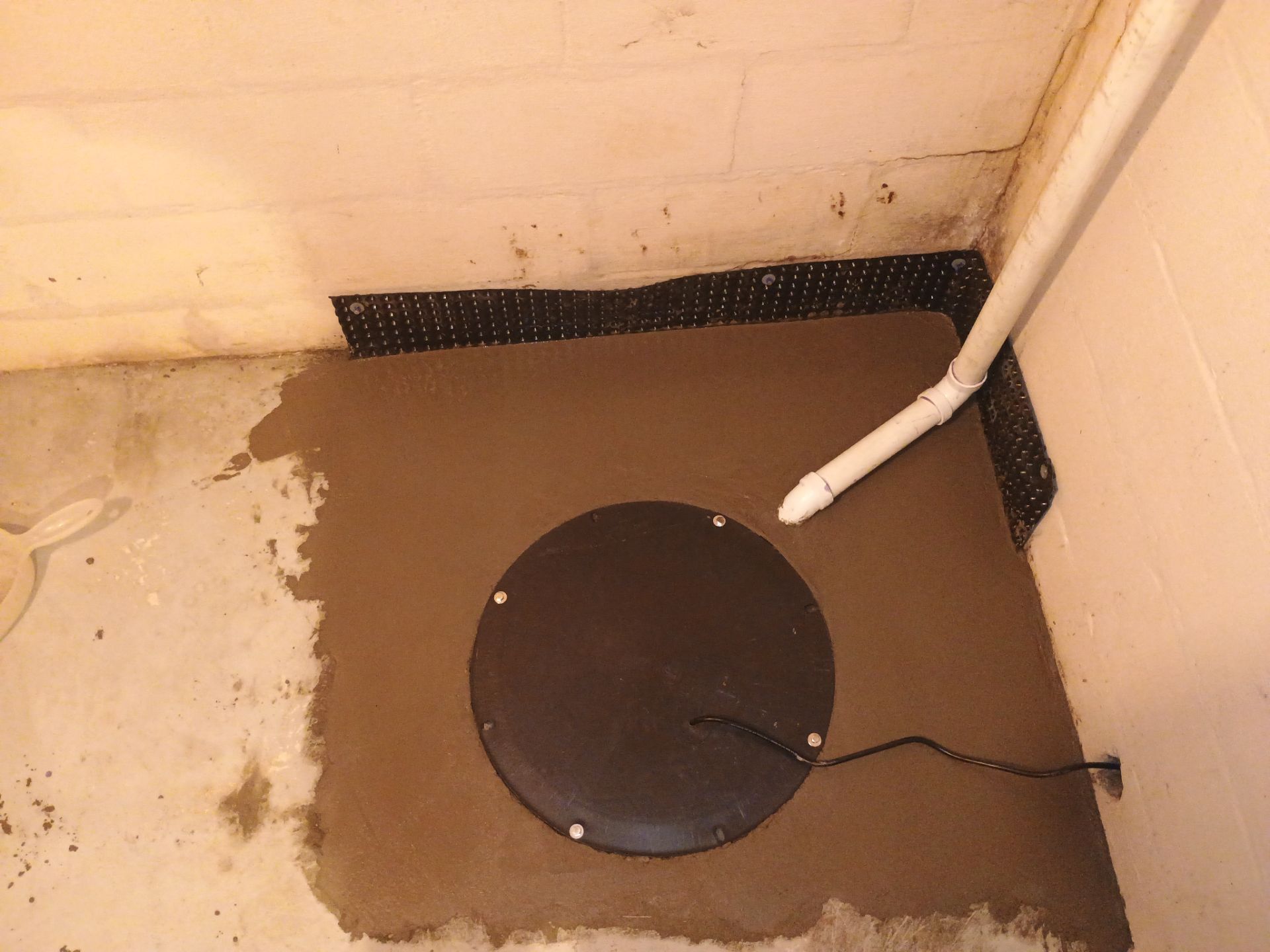 Sump Basin & Discharge Completion in St. Paul, MN by Waterproofing Northeast