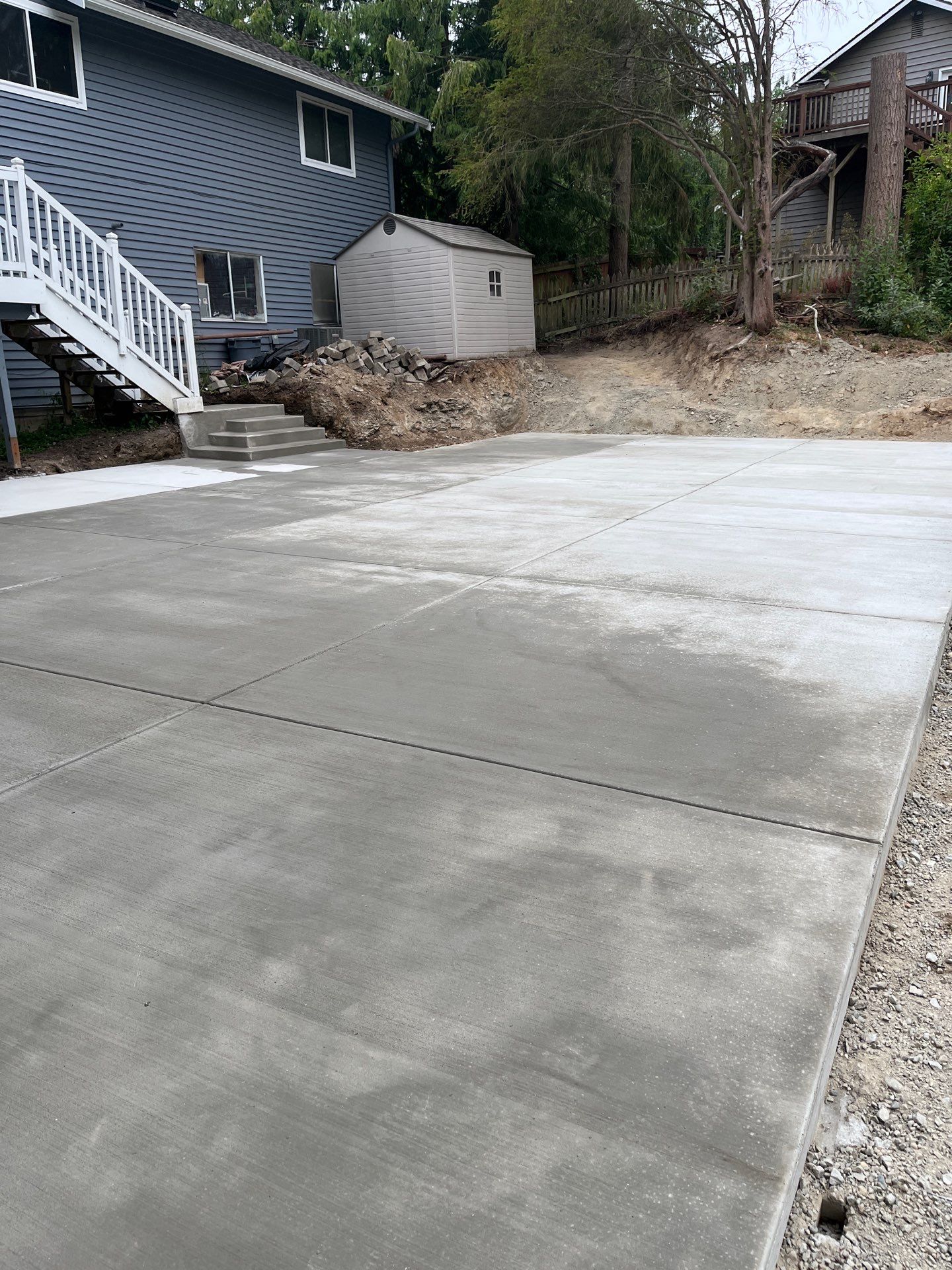 Concrete Back Patio Makeover  by Jireh Asphalt & Concrete Inc 