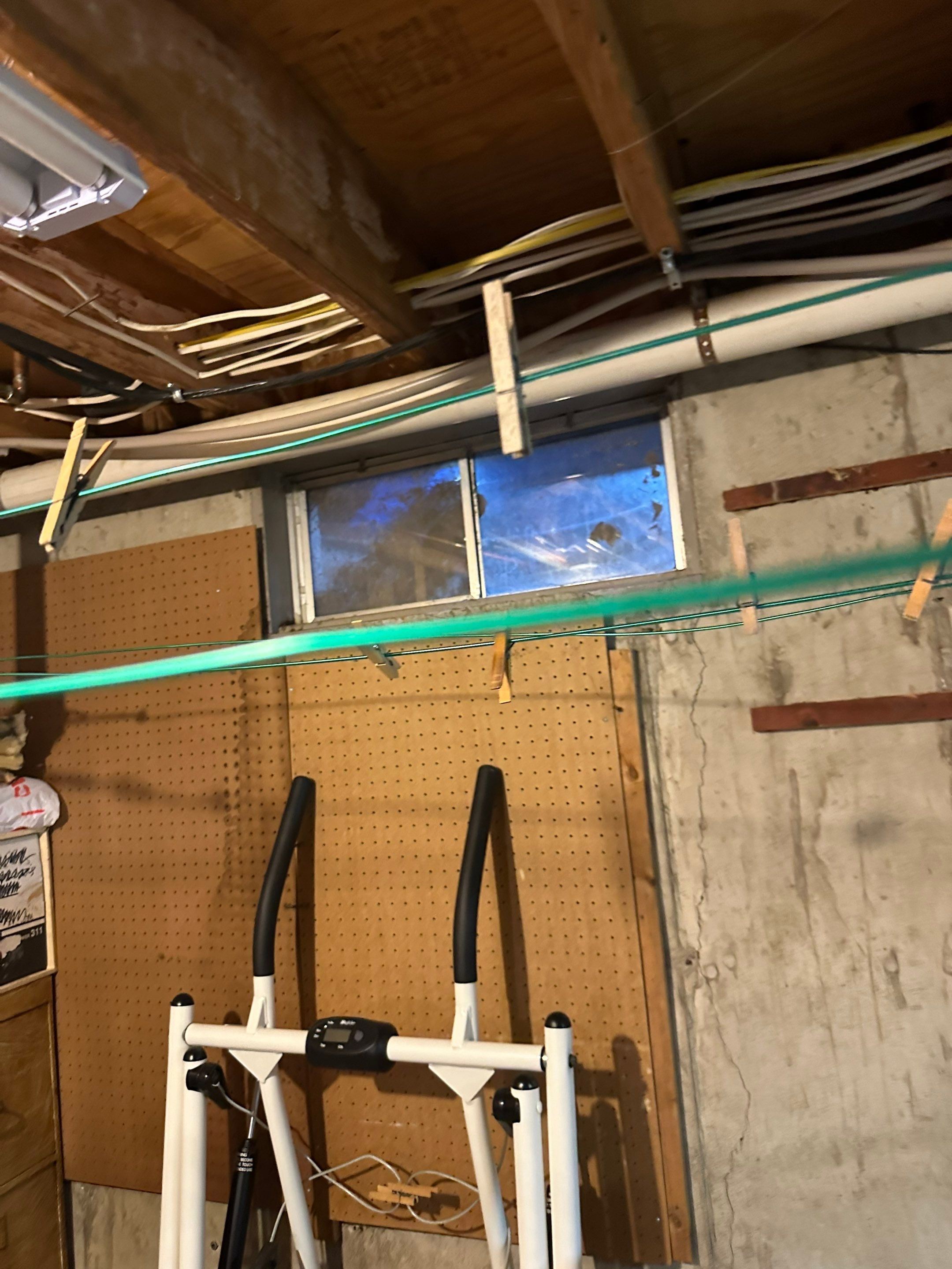 Granger storm water pushed through basement window and flooded the finished basement by BlueRed Restoration