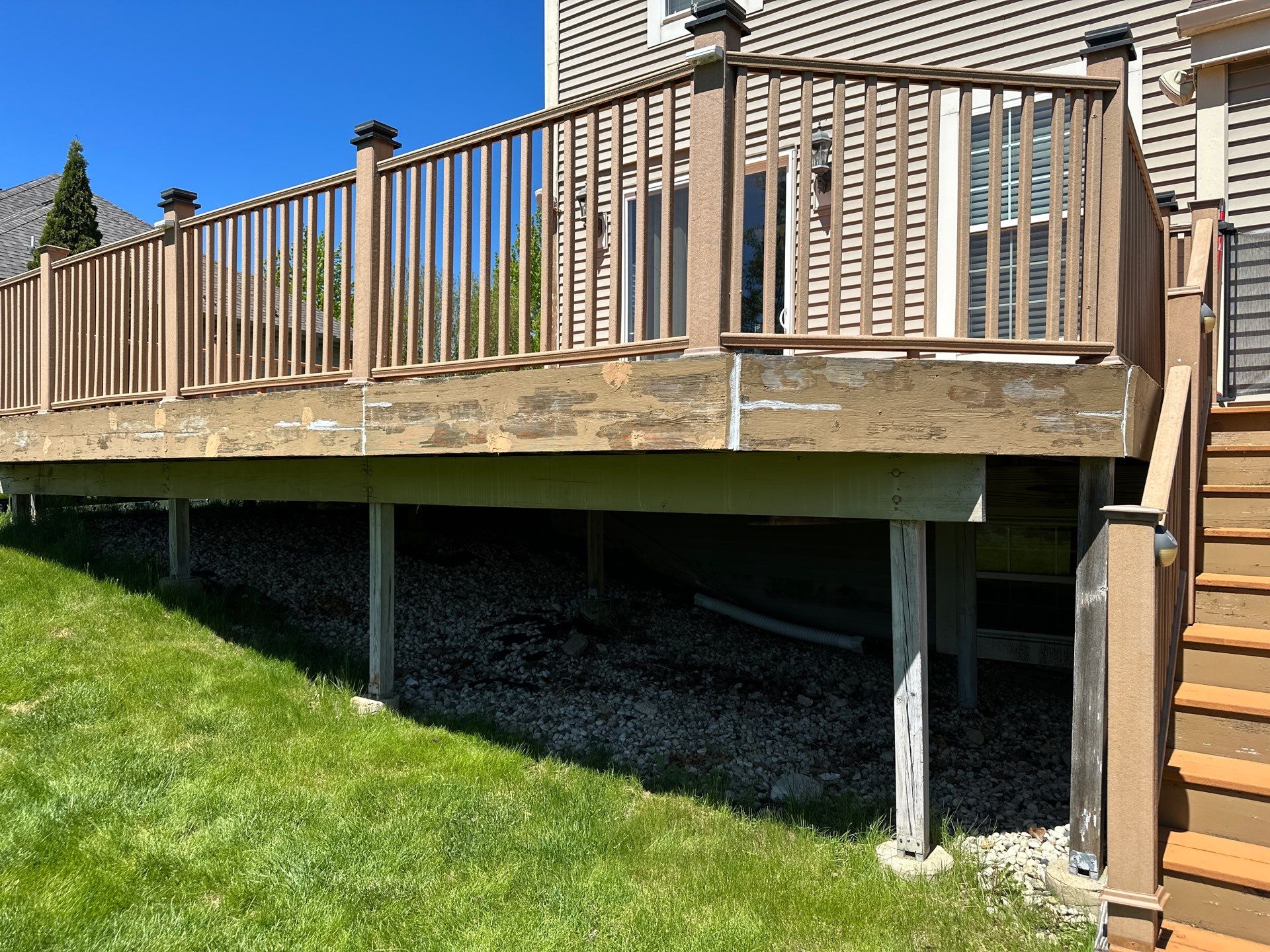 Elevated Wood Deck Refinishing and Railing Restoration in Waukesha by OCS Contracting Services