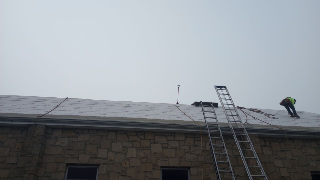 Commercial Roofing Installation using Performance Shingles by Mr. Roofer