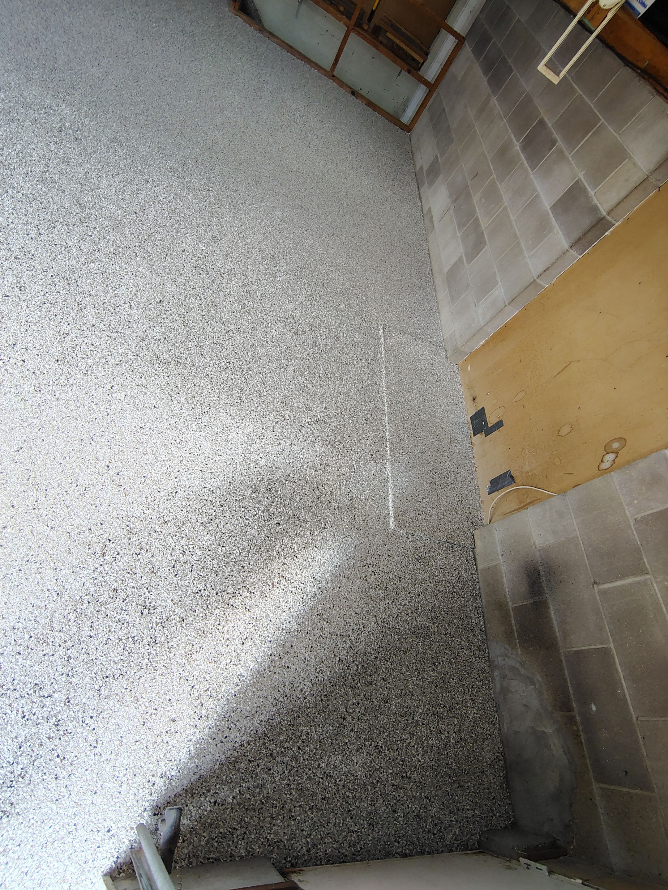 Sioux Falls Garage Epoxy Floor Installation and Concrete Crack Repair by Select Painting, Coatings & Garage Cabinets