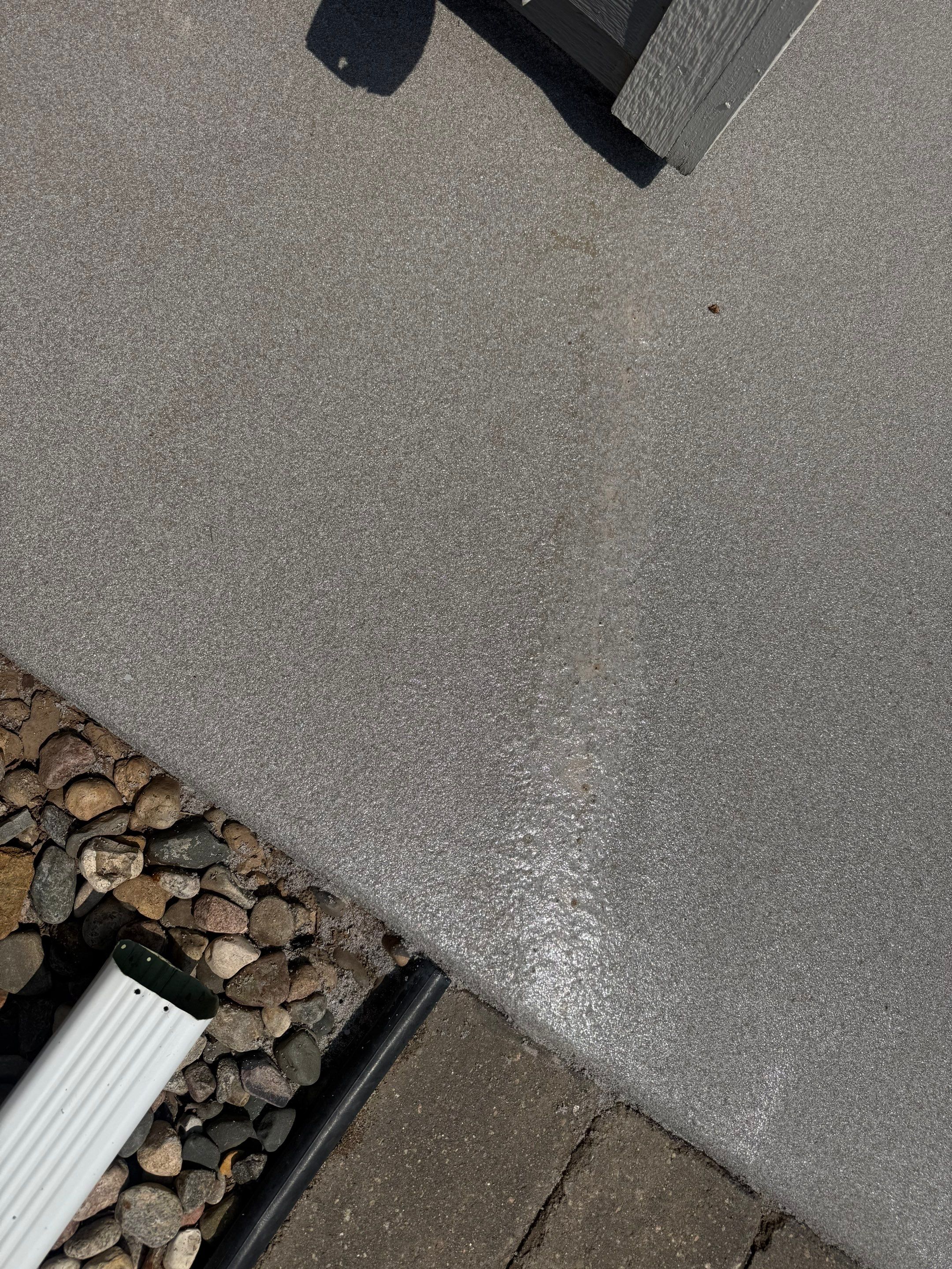 Concrete Patio Coating with Fuzzy Wool Finish in Sioux Falls by Select Painting, Coatings & Garage Cabinets