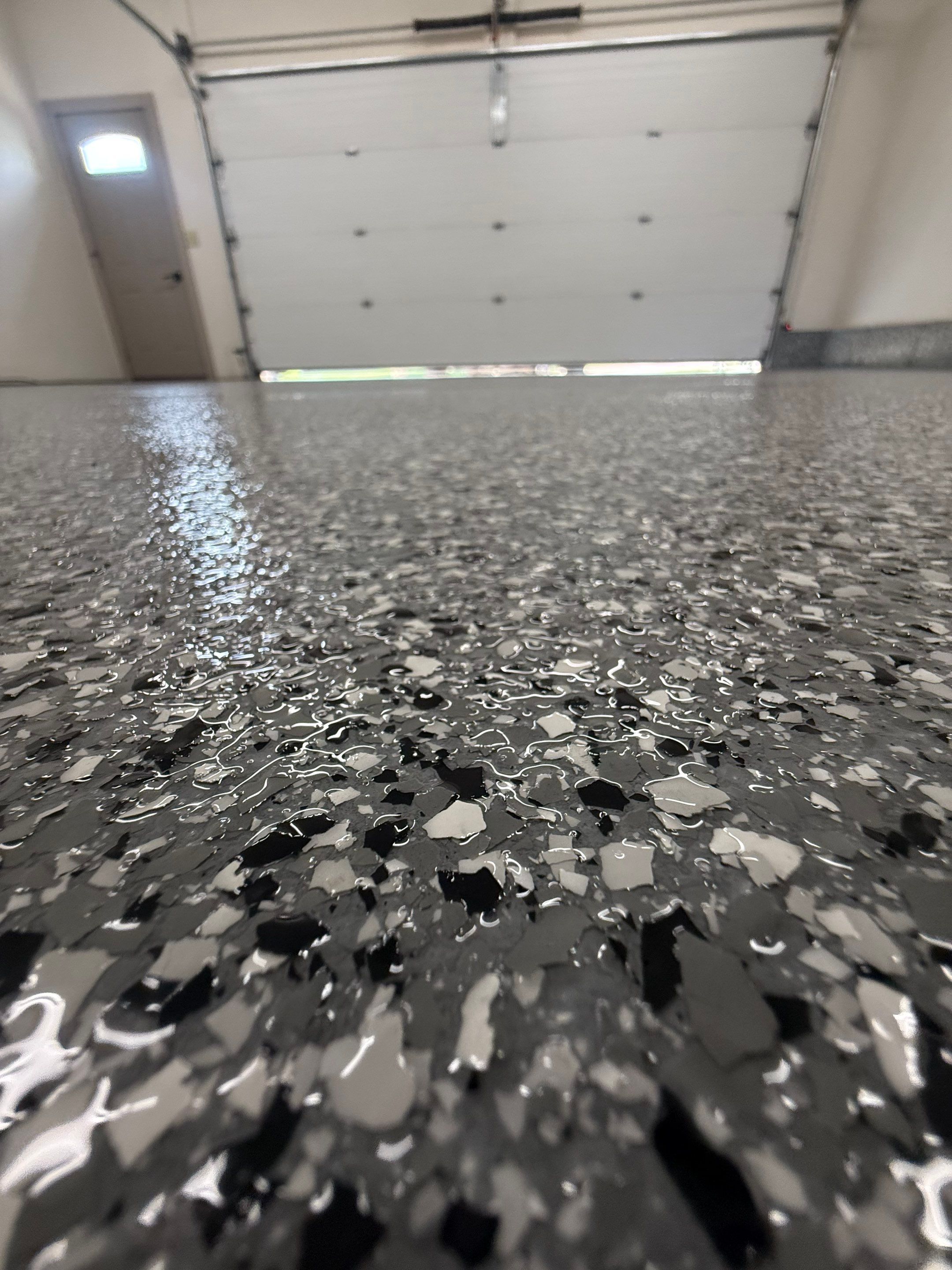 Smoke Flake Garage Floor Coating in Dell Rapids by Select Painting, Coatings & Garage Cabinets