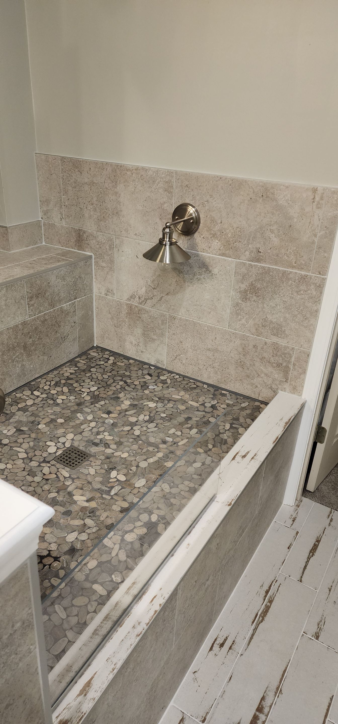 Full bathroom with giant shower AND doggy shower by The Shower Company