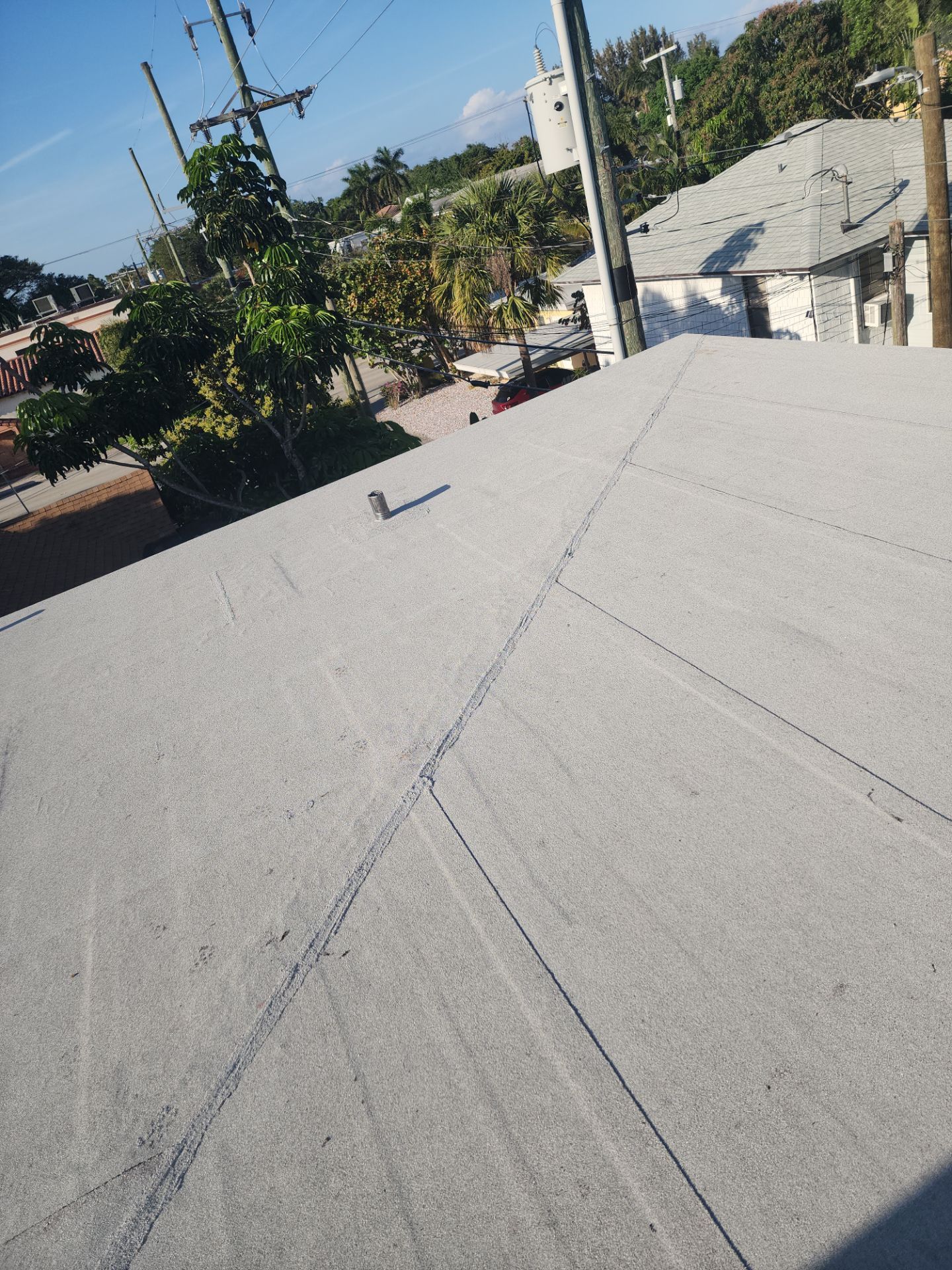 Flat Roof Replacement and Insulation Upgrade in Lake Worth Beach by Aastro Roofing